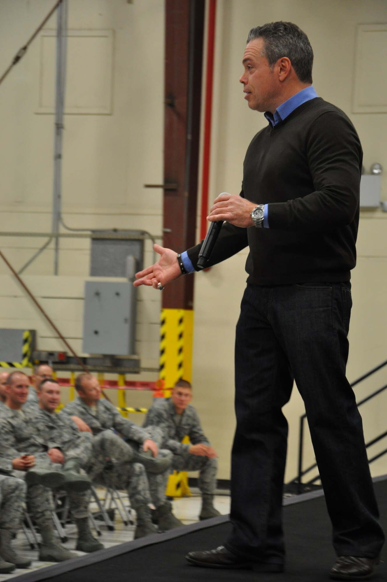 Comedian Bernie McGrenahan speaks to Airmen at Beale Air Force Base, Calif., Nov. 16, 2011, during the Happy Hour Comedy Tour. Team Beale invited McGrenahan to inform Airmen of the dangers and consequences of drinking and driving. 