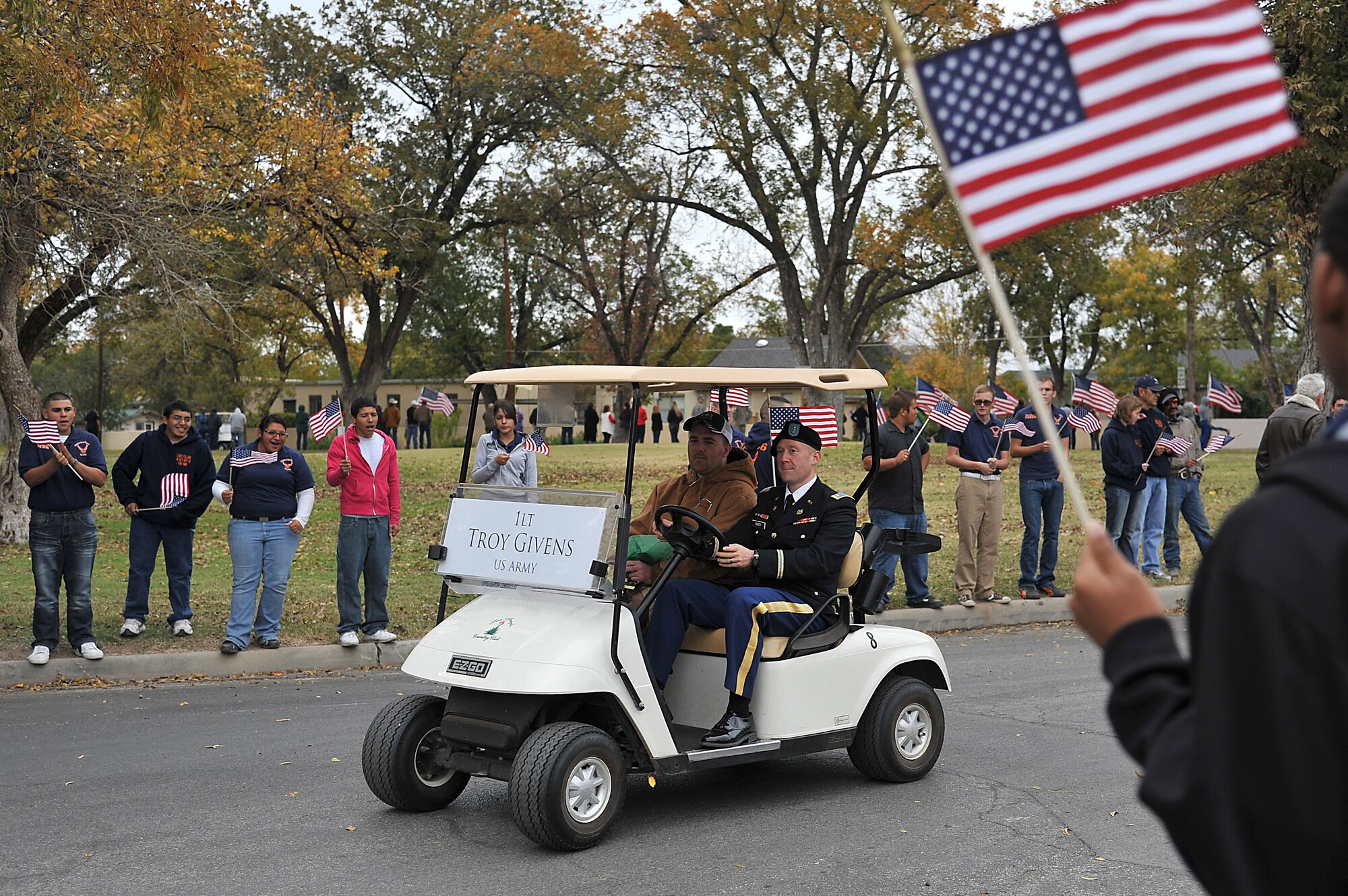 SAN ANGELO, Texas -- (From left:) Army 1st Lt. Troy Givens is escorted by Army 1st Lt. Nathanael Basch, 344th Military Intelligence Battalion, down the parade route during the annual Hunt for Heroes parade in downtown San Angelo Nov. 18.  The parade pays tribute to 25 wounded Iraq and Afghanistan combat veterans, which includes a West Texas hunting trip as well as numerous other events and activities. (U.S Air Force photo/Airman 1st Class Michael Smith)