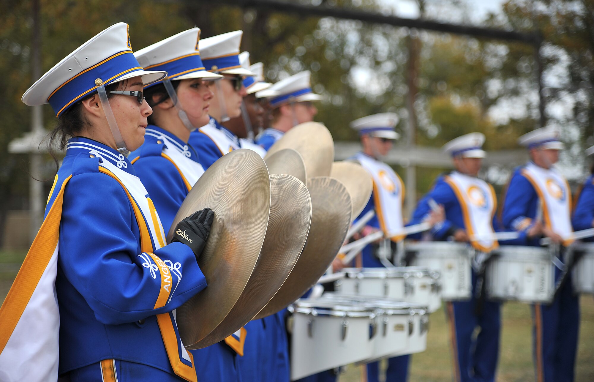 SAN ANGELO, Texas -- Angelo State University band members play during the Hunt for Heroes parade Nov. 18.  The parade pays tribute to 25 wounded Iraq and Afghanistan combat veterans, which includes a West Texas hunting trip as well as numerous other events and activities. (U.S Air Force photo/Airman 1st Class Michael Smith)