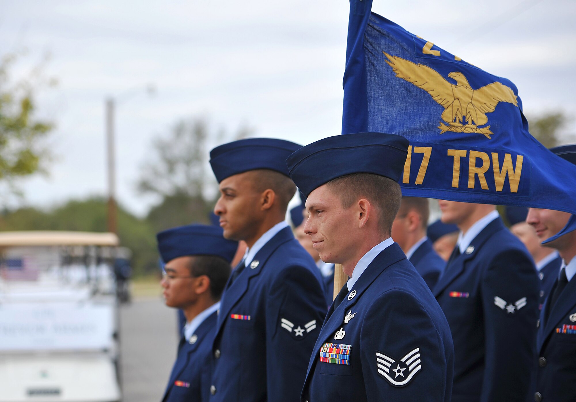 SAN ANGELO, Texas -- Airmen from the 17th Training Wing stand in formation as part of the annual Hunt for Heroes parade in downtown San Angelo along Park Drive Nov. 18.  The parade pays tribute to 25 wounded Iraq and Afghanistan combat veterans, which includes a West Texas hunting trip as well as numerous other events and activities. (U.S Air Force photo/Airman 1st Class Michael Smith)