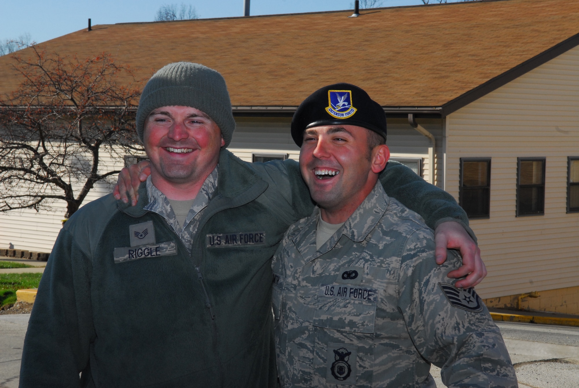 Five members of the 171st Security Forces Squadron serving with POMLT 2, a police operational mentor and liaison team, returned from Afghanistan today. Deployed for nearly a year, they were greeted by family members, friends and fellow Airmen.  (National Guard photo by Tech. Sgt. Stacy Gault)