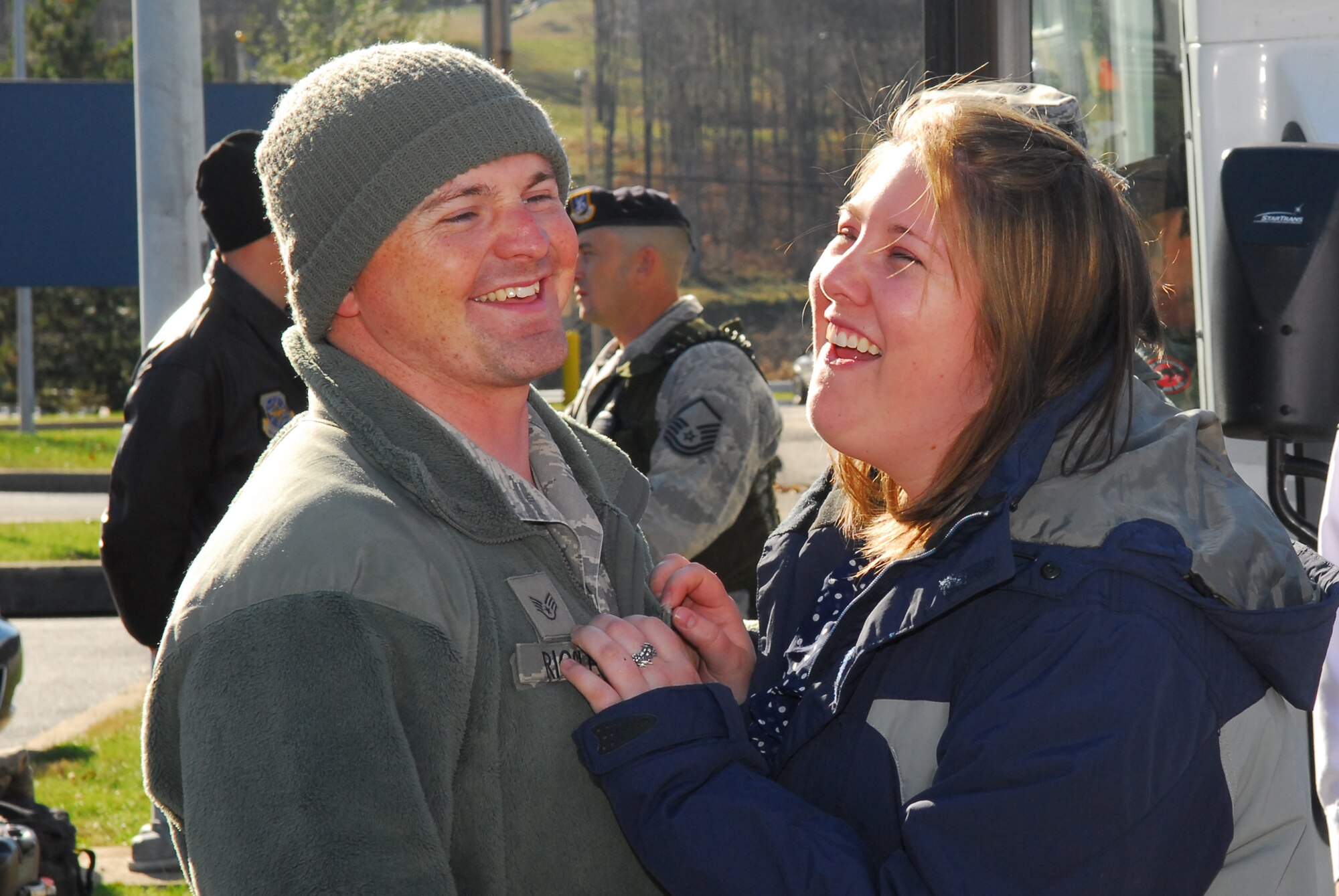 Five members of the 171st Security Forces Squadron serving with POMLT 2, a police operational mentor and liaison team, returned from Afghanistan today. Deployed for nearly a year, they were greeted by family members, friends and fellow Airmen.  (National Guard photo by Tech. Sgt. Stacy Gault)