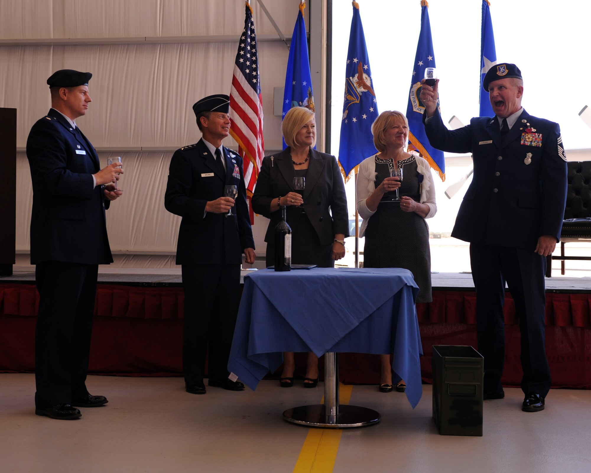 U.S. Air Force Chief Master Sgt. Harold Clark, 12th Air Force (Air Forces Southern), command chief, makes a ceremonial toast during his retirement ceremony on Davis-Monthan Air Force Base, Ariz., Nov. 18, 2011. (U.S. Air Force photo by Airman 1st Class Christine Griffiths/Released)