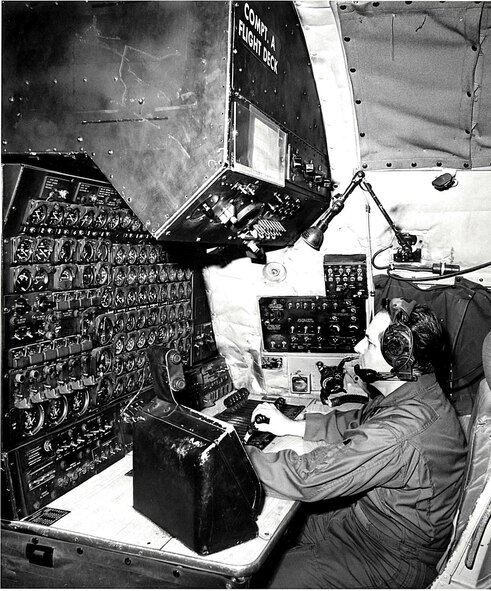 Retired Senior Master Sergeant Henry Costello monitors controls in the
cockpit of the C-124 Globemaster. The unit, then designated as the 911th
Military Airlift Group, flew the C-124 from 1966 to 1972. (U.S. Air Force Courtesy Photo)