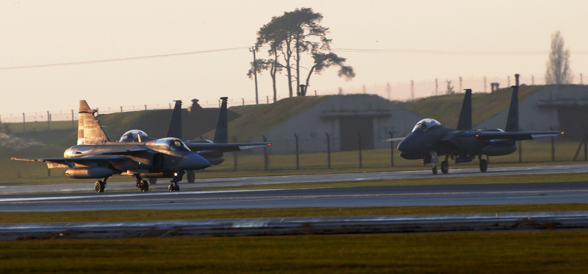 ROYAL AIR FORCE LAKENHEATH, England – Swedish Air Force JAS-39C Gripen from the 211th Fighter Squadron taxis before taking off Nov. 17, 2011. Members from the SAF and 48th Fighter Wing trained together to increase their interoperability and gather experience with dissimilar aircraft. (U.S. Air Force photo by Airman 1st Class Cory D. Payne)