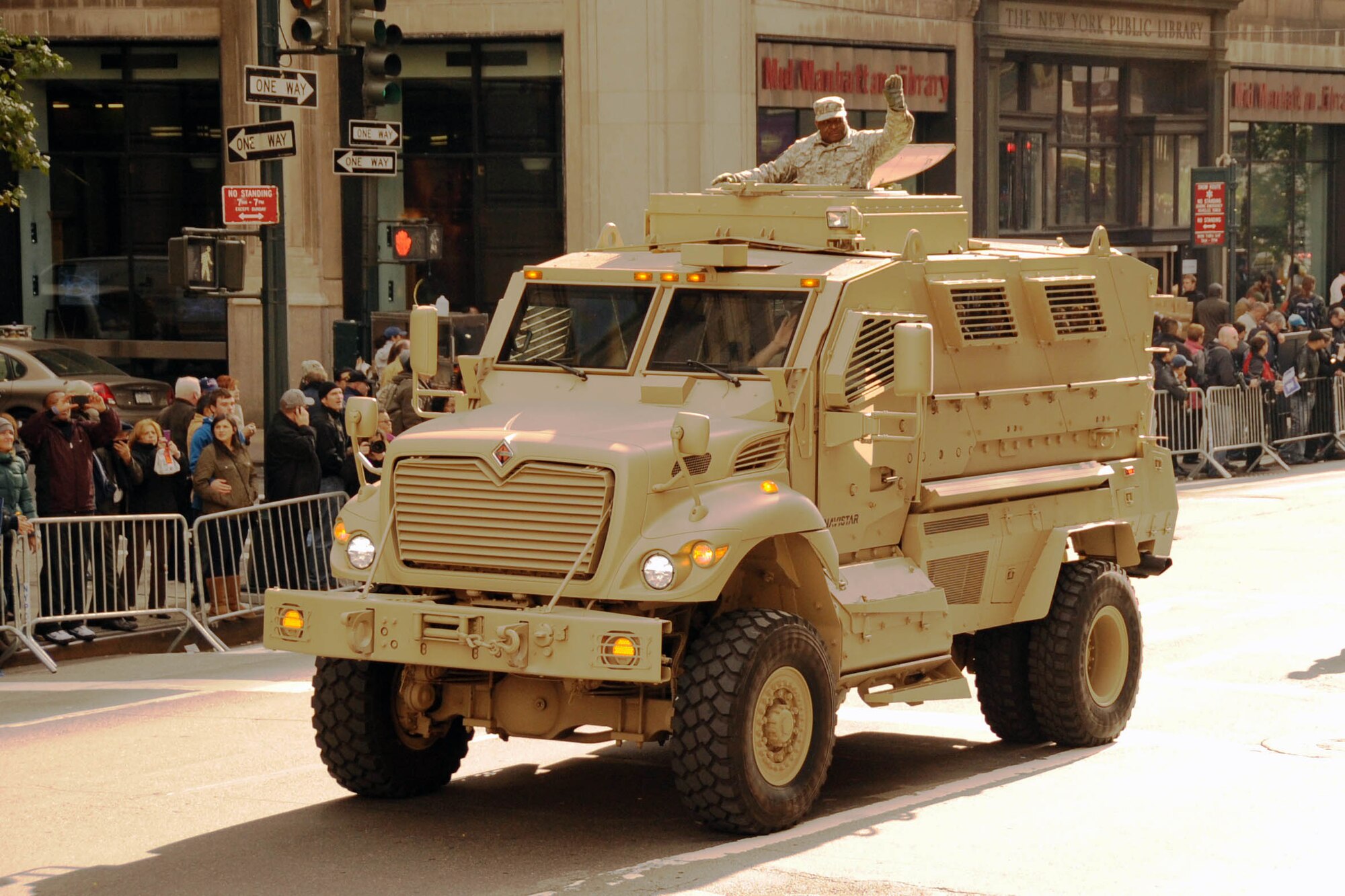 A mine resistant ambush protected vehicle rolls down 5th Ave. during the 2011 New York City Veterans Day Parade Nov. 11. More than 20,000 participants marched alongside 3,000 active-duty, Guard and Reserve servicemembers.(U.S. Air Force photo by Airman Ryan Throneberry/Released))