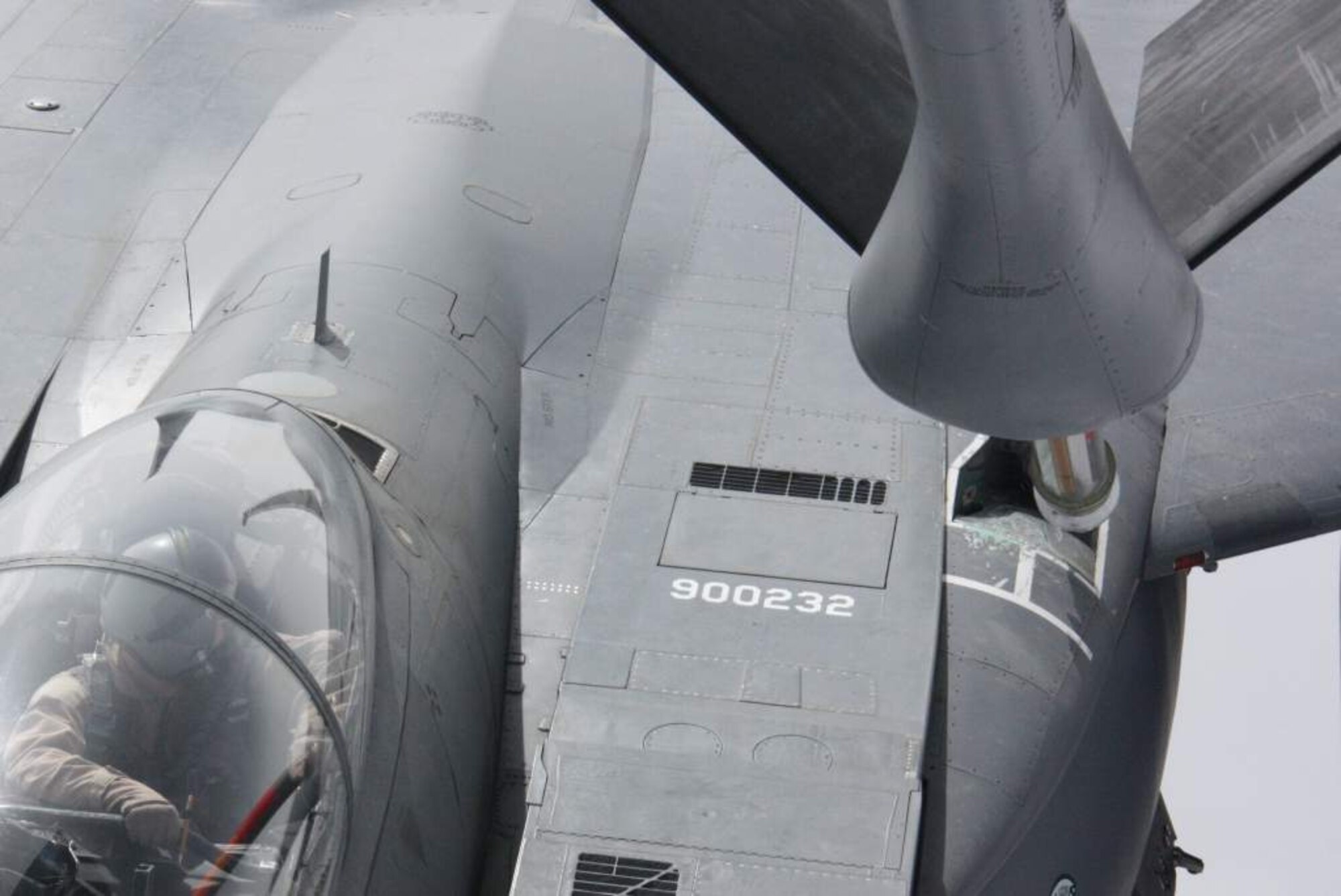 An aircrew member, from the 335th Fighter Squadron, monitors the delivery of fuel into his F-15E Strike Eagle from a KC-135 Stratotanker while flying over Afghanistan Nov. 18. The Stratotanker is deployed to the 22nd Expeditionary Air Refueling Squadron at Transit Center at the Manas, Kyrgyzstan, from the Alabama Air National Guard’s 117th Air Refueling Wing. The aircrew member and the Strike Eagle are both deployed from Seymour Johnson Air Force Base, N.C. (U.S. Air Force photo/Capt. Andrew Hardy)