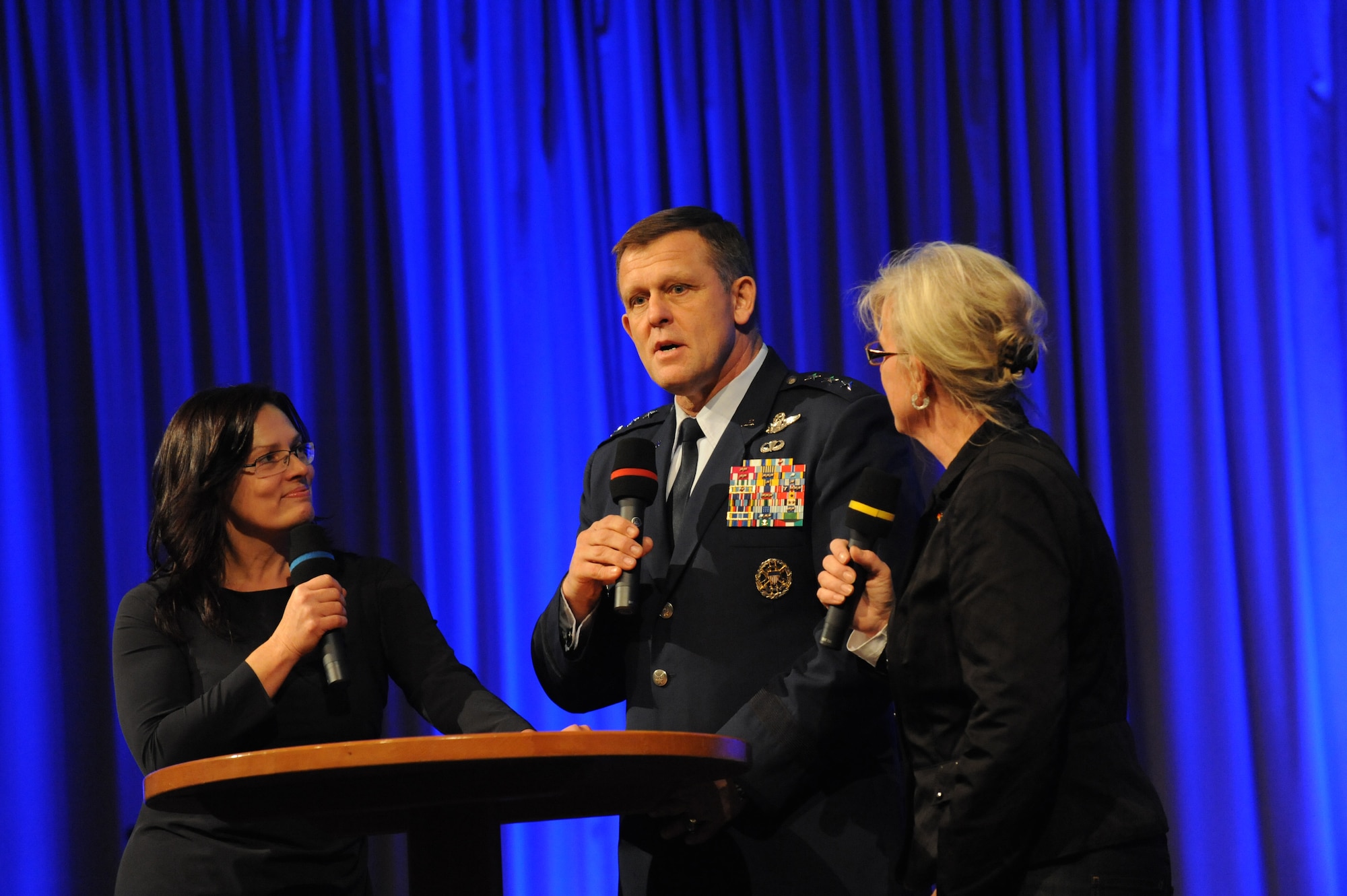 Air Force Lt. Gen. Frank Gorenc, 3rd Air Force commander, speaks during the ‘Year of Internationality’ event, Kaiserslautern, Germany, Nov.16, 2011 as Stefanie Tücking and Claudia Beavers-Rapp look on.  During the event individuals from the U.S. were given the opportunity to present information and share personal stories about their respective country to the local community. (Air Force photo by Airman 1st Class Caitlin O’Neil-McKeown)