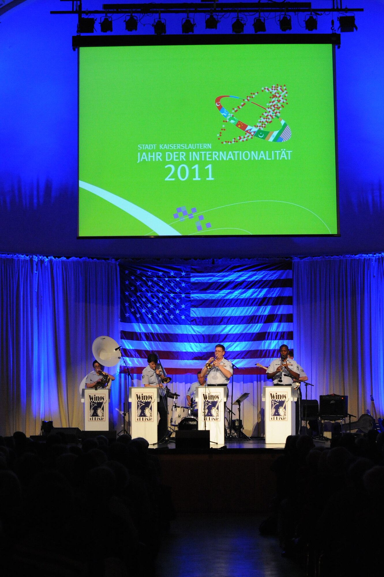 Wings of Dixie, the U.S. Air Forces in Europe jazz ensemble, perform during the ‘Year of Internationality’ event, Kaiserslautern, Germany, Nov.16, 2011. During the event individuals from the U.S. were given the opportunity to present information and share personal stories about their respective country to the local community. (Air Force photo by Airman 1st Class Caitlin O’Neil-McKeown)