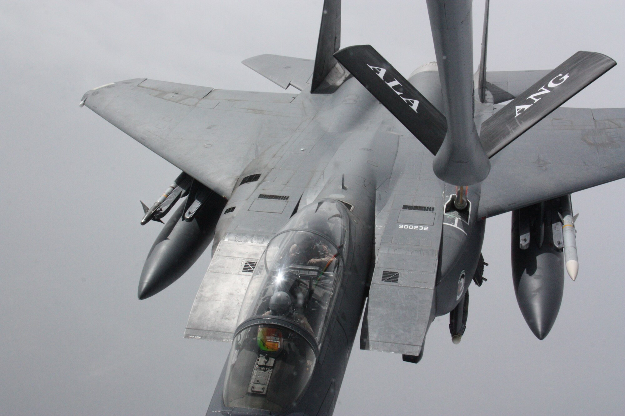 A KC-135 Stratotanker refuels an F-15E Strike Eagle over Afghanistan Nov. 18. The KC-135 Stratotanker has provided the core aerial refueling capability for the United States Air Force for more than 50 years. The Stratotanker is deployed to the 22nd Expeditionary Air Refueling Squadron at the Transit Center at Manas, Kyrgyzstan, from the Alabama Air National Guard’s 117th Air Refueling Wing. The Fighting Falcon is deployed from Seymour Johnson Air Force Base, N.C. (U.S. Air Force photo/Capt. Andrew Hardy)