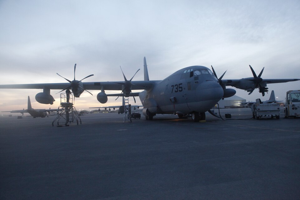 Marines maintain the Harvest Hawk equipped KC-130J Hercules after landing at Kandahar Airfield, Afghanistan, Nov. 19.  The Harvest Hawk system adds close-air support to the long list of capabilities, including aerial refueling and battlefield illumination, of the Marine Corps’ largest aircraft. To learn more about Marines in Afghanistan, join them at http://www.facebook.com/regionalcommandsouthwest.