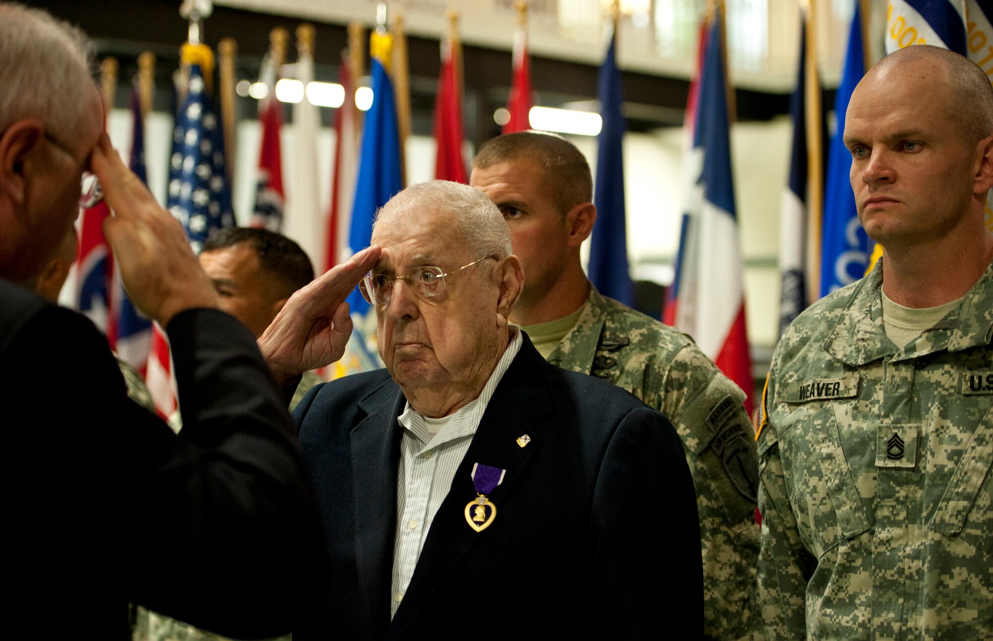 Charles “Buster” Donnell was re-pinned with his Purple Heart medal during his induction ceremony into the Military Order of the Purple Heart at the Air Force Armament Museum Nov. 18.  Donnell, now 90 years old, served in the Army’s 103rd Infantry Regiment during the Japan campaign in World War II.  Members of the 6th Ranger Training Battalion attended and took part in the ceremony and presentation.  (U.S. Air Force photo/Samuel King Jr.)