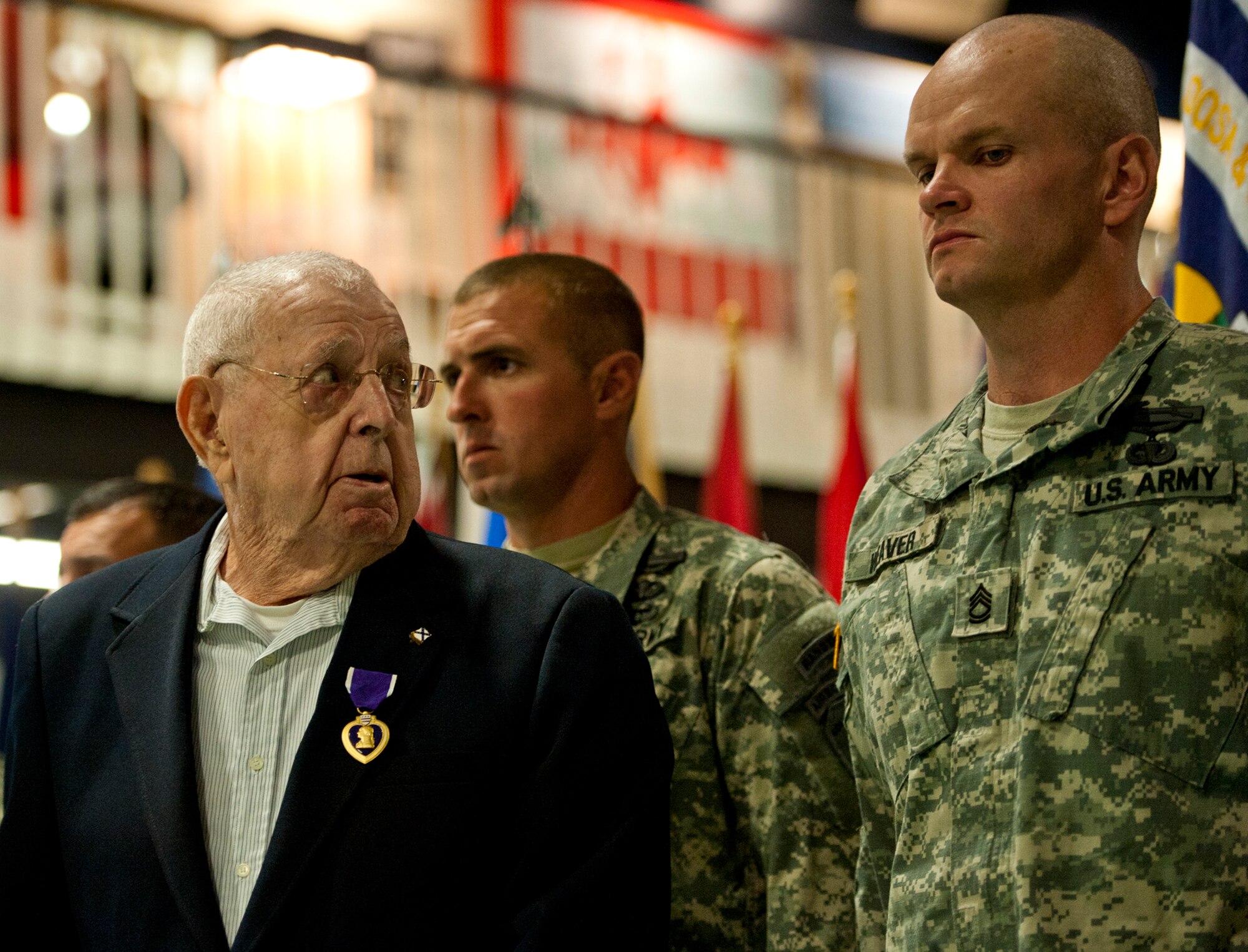 Charles “Buster” Donnell was re-pinned with his Purple Heart medal during his induction ceremony into the Military Order of the Purple Heart at the Air Force Armament Museum Nov. 18.  Donnell, now 90 years old, served in the Army’s 103rd Infantry Regiment during the Japan campaign in World War II.  Members of the 6th Ranger Training Battalion attended and took part in the ceremony and presentation.(U.S. Air Force photo/Samuel King Jr.)