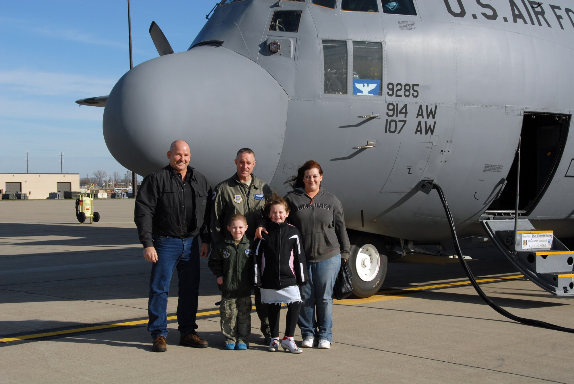 Donovan Benzin became a Guardsman for a day at the 107th Airlift Wing, Niagara Falls ARS. Here he is pictured with his family after touring the inside of the C-130 aircraft.