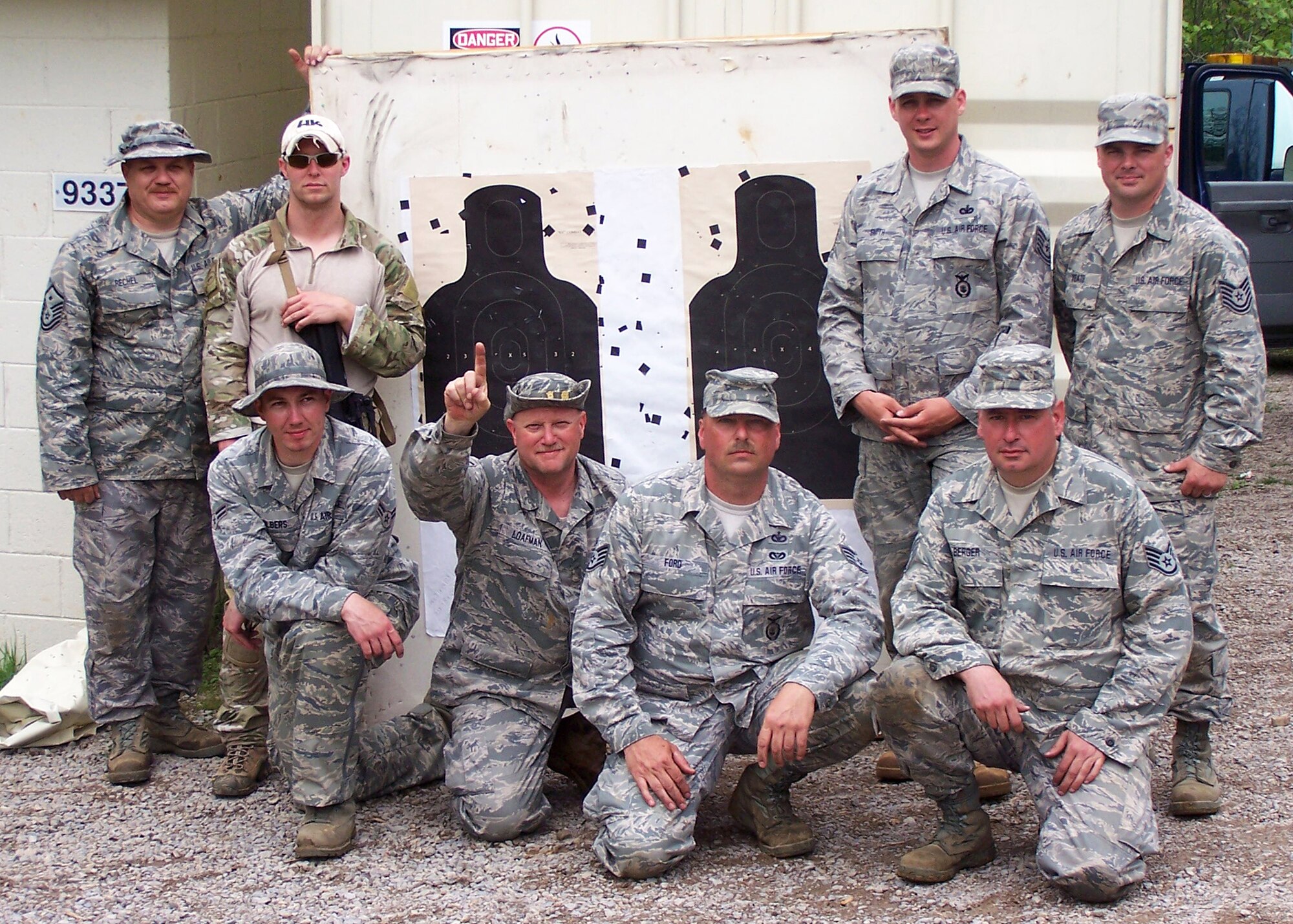 Marksmen from the Kentucky Air National Guard's 123rd Airlift Wing took top honors in the Adjutant General's Kentucky National Guard State Combat Training Event, held May 1, 2011, at Fort Knox, Ky. Pictured from left to right, back row, are Master Sgt. Norm Rechel, Tech. Sgt. Bryan Hunt, Tech Sgt. Erik Smith, and Tech. Sgt. Don Yeats. On the front row are Airman 1st Class Abe Hilbers, Master Sgt. Darryl Loafman, Tech. Sgt. Randy Ford and Staff Sgt. Jim Berger. (Courtesy Photo)