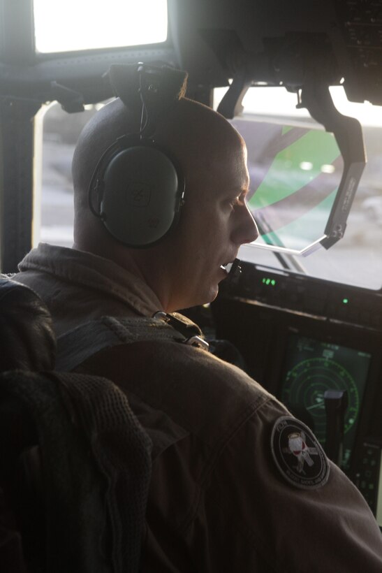 Capt.  Jason Dale performs preflight checks on a KC-130J Hercules at Kandahar Airfield, Afghanistan, Nov. 21.  Dale, from Versailles, Ky., is an aircraft commander for the Harvest Hawk weapon system equipped aircraft that provide close-air support to ground forces. To learn more about Marines in Afghanistan, join them at http://www.facebook.com/regionalcommandsouthwest.