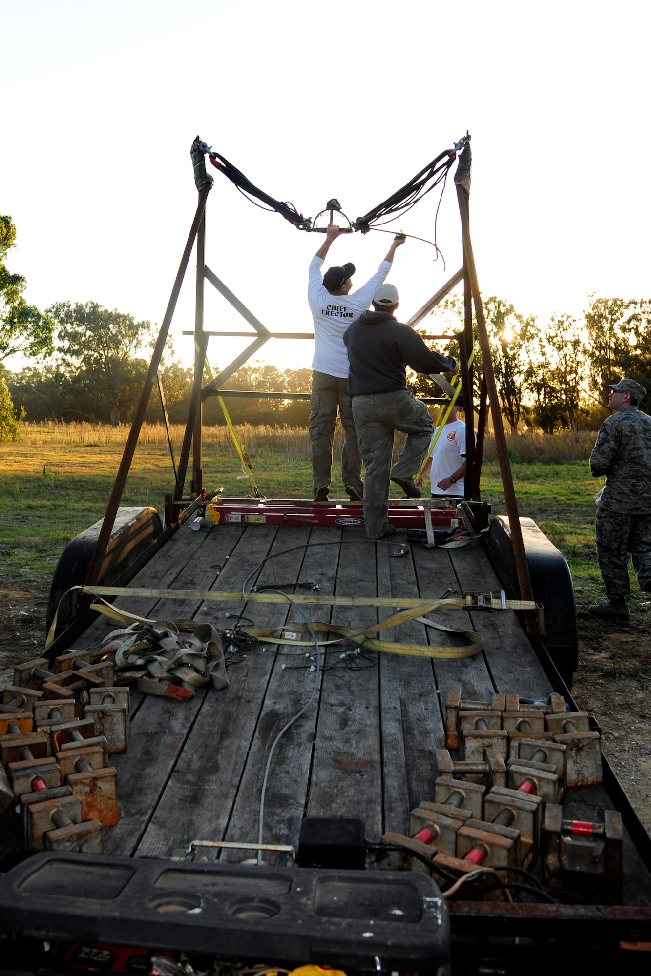 VANDENBERG AIR FORCE BASE, Calif. – The 1st Air and Space Test Squadron team readies a hydraulic pumpkin launcher at Cocheo Park here Friday, Nov. 18, 2011. The team was participating in the 30th Launch Group’s annual pumpkin toss event. (U.S. Air Force photo/Senior Airman Lael Huss)