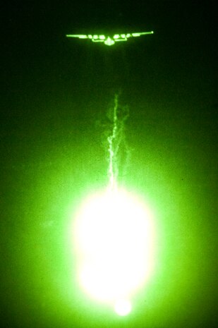 A U.S. Air Force C-17 Globemaster III performs evasive countermeasures by launching flares during a Mobility Air Forces Exercise Nov. 16, over the Nevada Test and Training Range. The U.S. Air Force Weapons School holds MAFEX twice a year to test the ability of C-17 Globemaster and C-130 Hercules aircrews from Air Force bases around the world to join together in a formation at a specific time and location to insert ground forces anywhere in the world. The 820th RED HORSE Airborne Flight conducted airdrops over the NTTR. (U.S. Air Force photo by Airman 1st Class Daniel Hughes/Released)