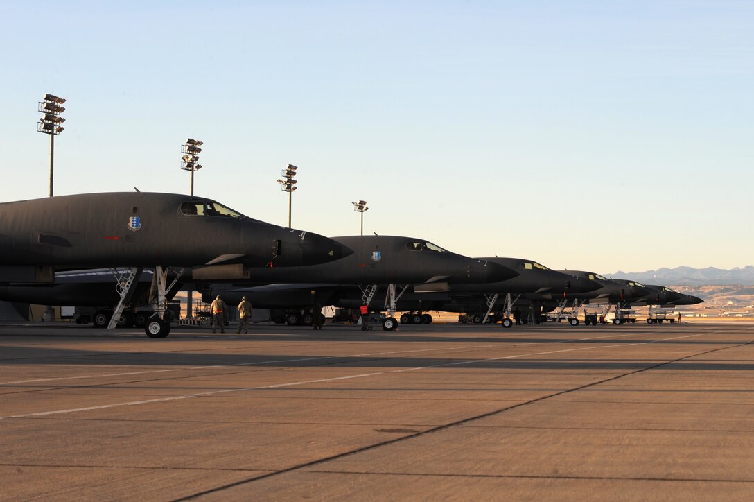 B-1B Lancers sit on the flightline in preparation for an operations surge at Ellsworth Air Force Base, S.D., Nov. 17, 2011. The training opportunity tested the combat readiness and effectiveness of the B-1B Lancer, which can rapidly deliver massive quantities of precision and non-precision weapons against any adversary, anywhere in the world. (U.S. Air Force photo by Senior Airman Kasey Close/Released)