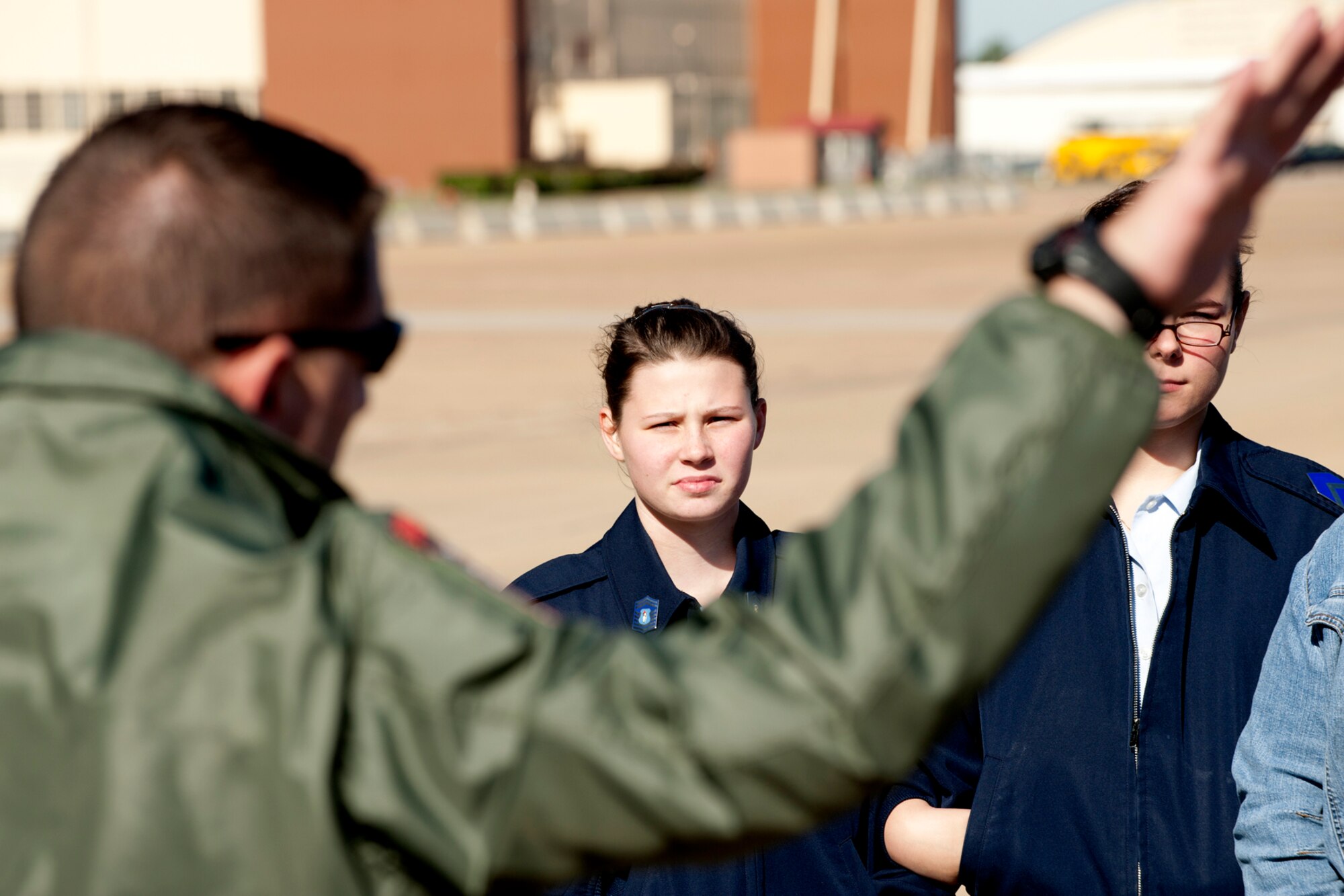 U.S. Air Force 2nd Lt. Brandon Lublin, 11th Bomb Squadron copilot, answers questions about the B-52 bomber from cadets of the Marshall High School Junior Reserve Officers' Training Corps (JROTC), Barksdale Air Force Base, La., Nov. 18, 2011. The cadets visited Barksdale and were given a flight line tour of B-52 bomber. (U.S. Air Force photo by Master Sgt. Greg Steele/Released)