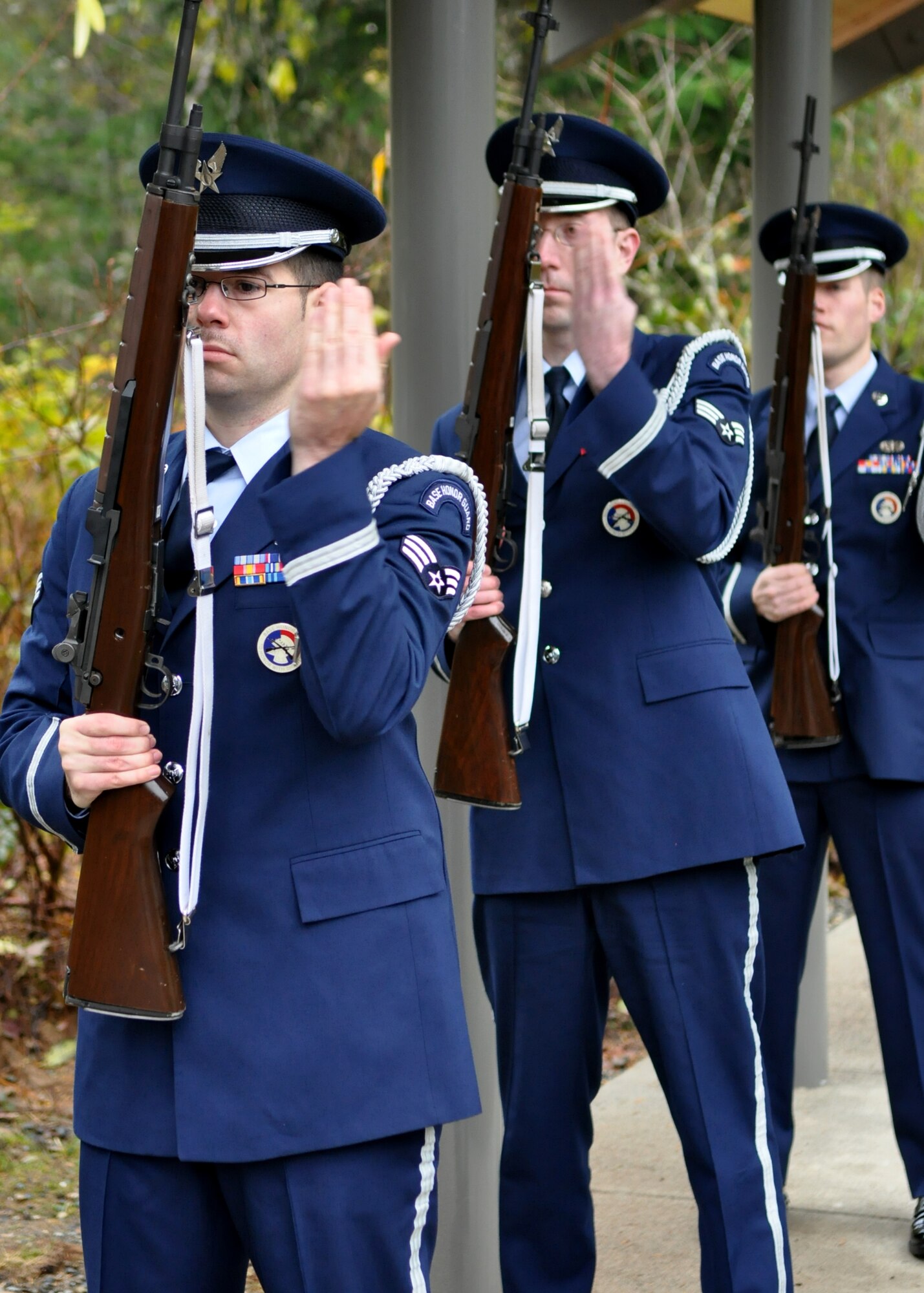 Airmen assigned to the McChord Field Honor Guard load their rifles during a funeral Nov. 18, 2011, at Tahoma National Cemetery in Kent, Wash. (U.S. Air Force photo/Airman 1st Class Leah Young)