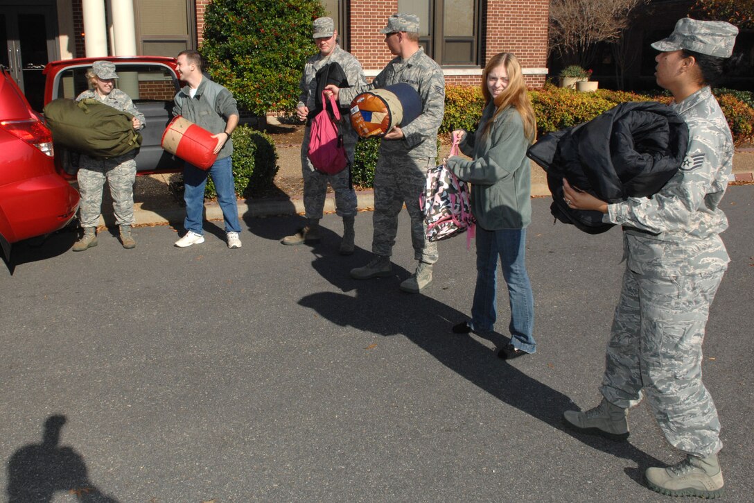 111118-F-AO544-009
Langley Airmen load vehicles with donations during the 2nd Annual Used Coat and Survival Backpack Drive at Langley Air Force Base, Va., Nov. 18, 2011. Donations from this drive are used to assist homeless and low income veteran families in the Hampton Roads region. (U.S. Air Force photo by Staff Sgt. Jeffrey Nevison/Released)
