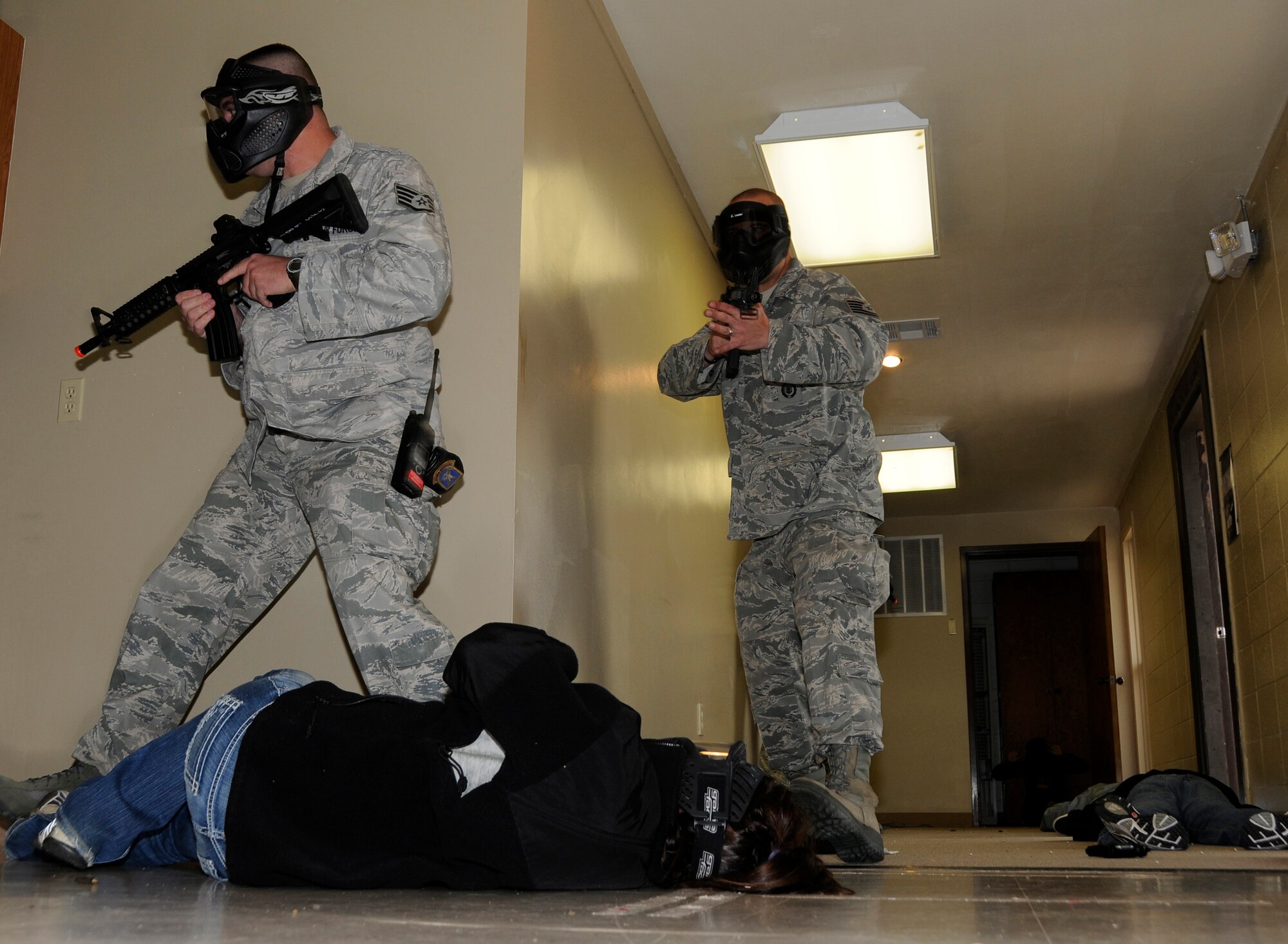 Airmen with the 188th Security Forces Squadron conduct a room-clearing exercise during a Unit Training Assembly Nov. 6 at the 188th Fighter Wing. (U. S. Air Force photo by Airman 1st Class Hannah Landeros/188th Fighter Wing Public Affairs)