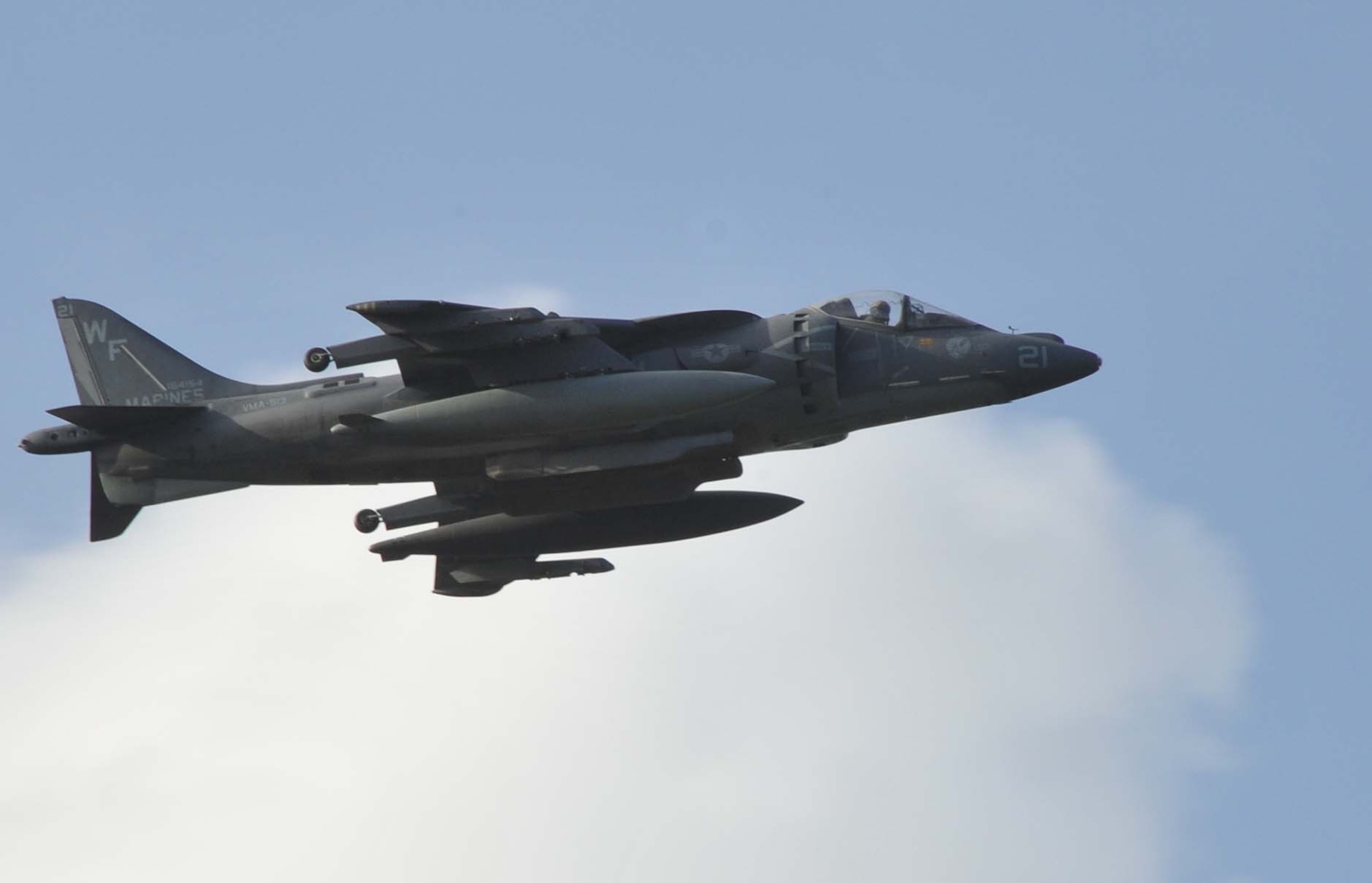 An AV-8B Harrier from Marine Attack Squadron 513, takes off from the Lajes
Field flightline toward Marine Corps Air Station Yuma, Ariz., Nov. 18, 2011.
A total of ten Harriers were returning home from a six-month deployment at
Kandahar Air Field, Afghanistan.  (Photo by Guido Melo) 
