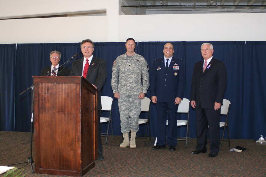 AEDC Commander Col. Michael Brewer and Tennessee Army National Guard Lt. Col. Warner Holt, the Regimental Fire support coordinator for the 278th Armored Cavalry Regiment headquartered in Winchester and safety manager for ATA, were among the speakers Oct. 15 at the second annual Let Freedom Ring Military Community Appreciation Day at the Monterey Station in Cowan. The AEDC Honor Guard also presented the colors and performed the prisoner of war/missing in action (POW/MIA) table ceremony. Pictured are the Rev. Robert Beal, Master of Ceremonies Dr. Jerry Anderson, Colonel Holt, Colonel Brewer and retired Army Col. L.Z. Johnson. The Let Freedom Ring event is meant to recognize and show appreciation to the entire military community, including active duty personnel as well as National Guard, Reserve forces, retired military and their families. (Photo provided)