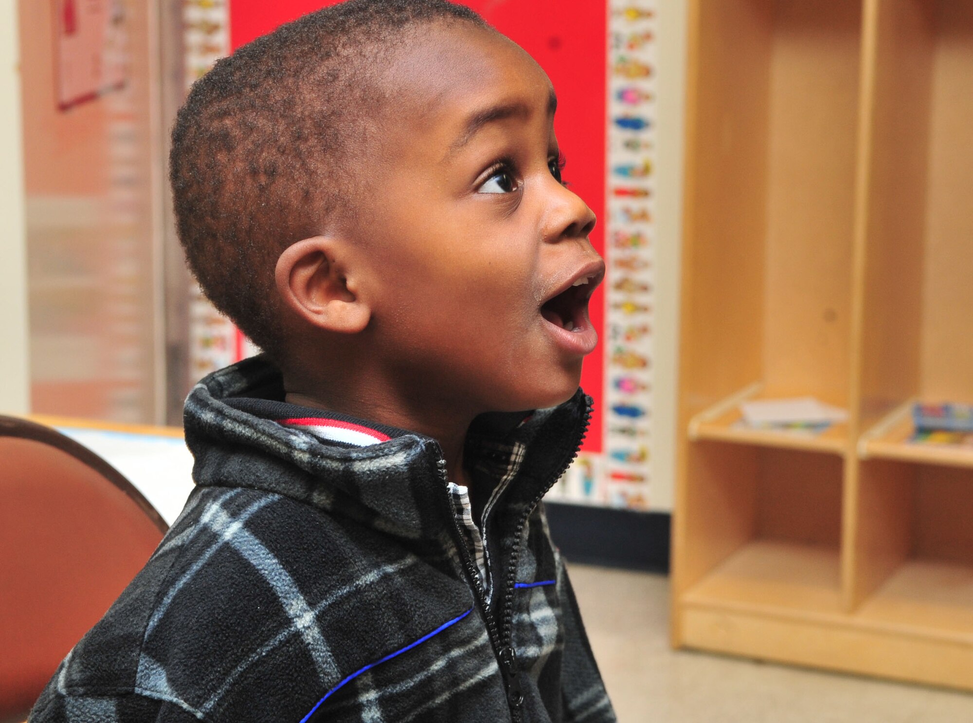Preston Hiliare reacts to the news that he will receive the FluMist vaccine at the Child Development Center (CDC) at Seymour Johnson Air Force Base, N.C., Nov. 17, 2011. Airmen from the 4th Medical Group (MDG) administered flu shots and FluMist to children, parents and employees at the CDC. The FluMist is available to children over the age of 2 and adults 49 and younger. Preston, 3, is the son of Maj. Crystal Hiliare, 4 MDG diagnostic and therapeutics flight commander. (U.S. Air Force photo by Senior Airman Marissa Tucker)