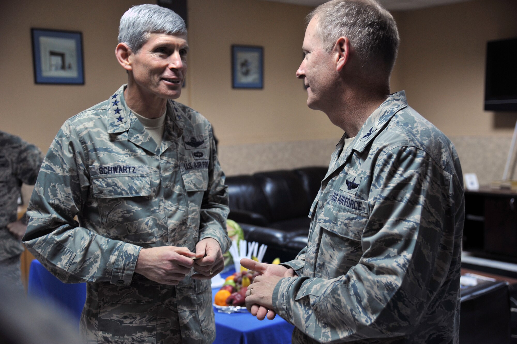 Air Force Chief of Staff Gen. Norton Schwartz talks with Col. Michael Zick, 386th Air Expeditionary Wing commander, at an undisclosed location in Southwest Asia, Nov. 18, 2011. (U.S. Air Force photo/Master Sgt. Carlotta Holley)

