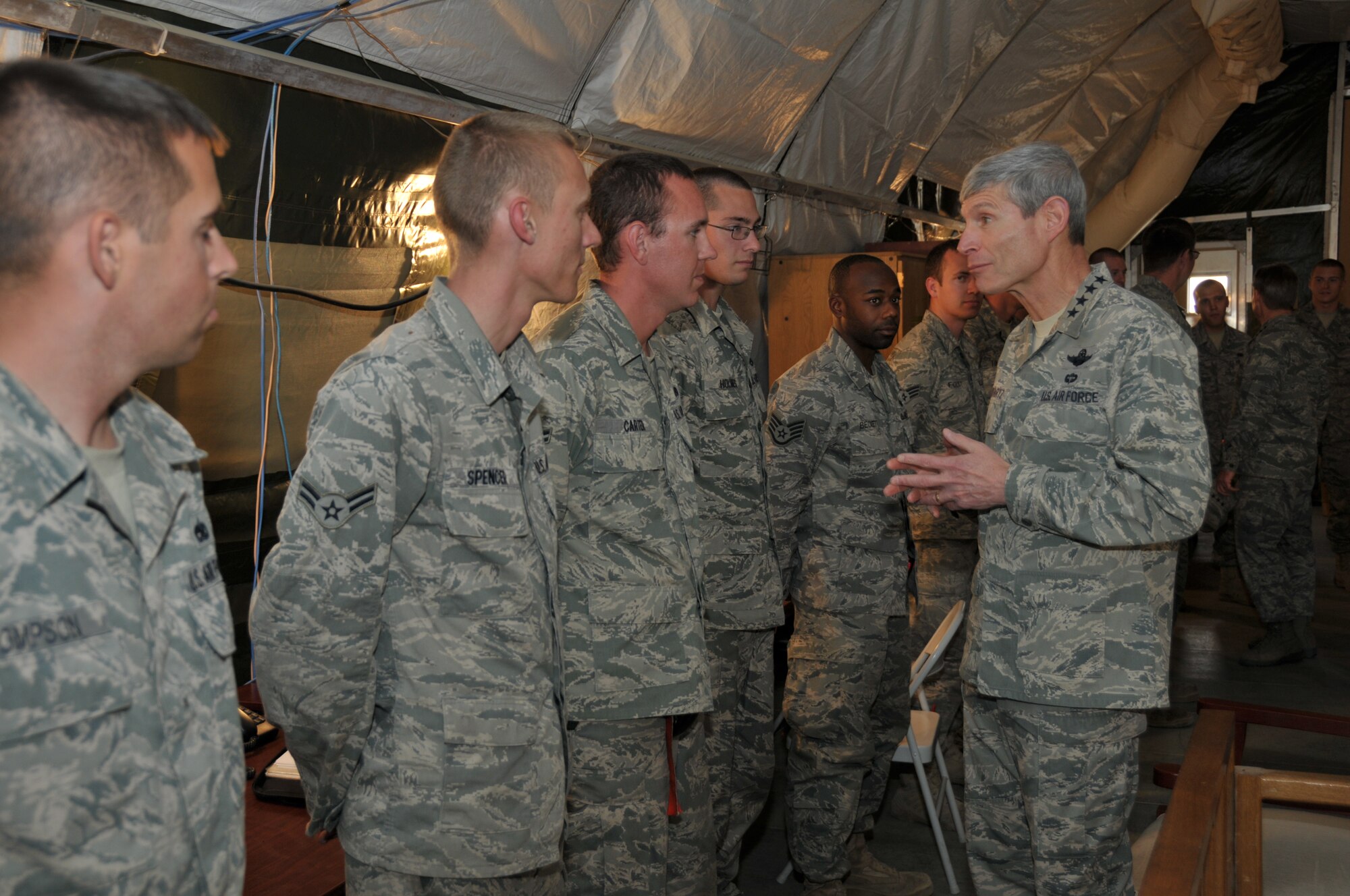 Air Force Chief of Staff Gen. Norton Schwartz meets Airmen of the 332nd Expeditionary Aircraft Maintenance Squadron during his visit to the 332nd Air Expeditionary Wing Nov. 18, 2011. Schwartz thanked the Airmen for the work they are doing and reiterated the importance of their efforts to support the final days of Operation New Dawn. (U.S. Air Force photo by Master Sgt. Paul Mann) 