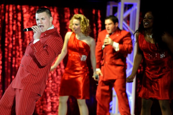 1st Lt. Robert Doyle, a member of the Tops In Blue 2011 World Tour, sings during a performance at the Misawa Civic Center in Misawa City near Misawa Air Base, Japan, Nov. 15. More than 1,000 Japanese and Americans attended the free show which featured the swinging jazz of Nat King Cole, the great rock and roll sounds of Little Richard, cool Motown Rhythm and Blues of Marvin Gaye, some inspirational country sounds and much more. (U.S. Air Force photo/Tech. Sgt. Marie Brown) 
