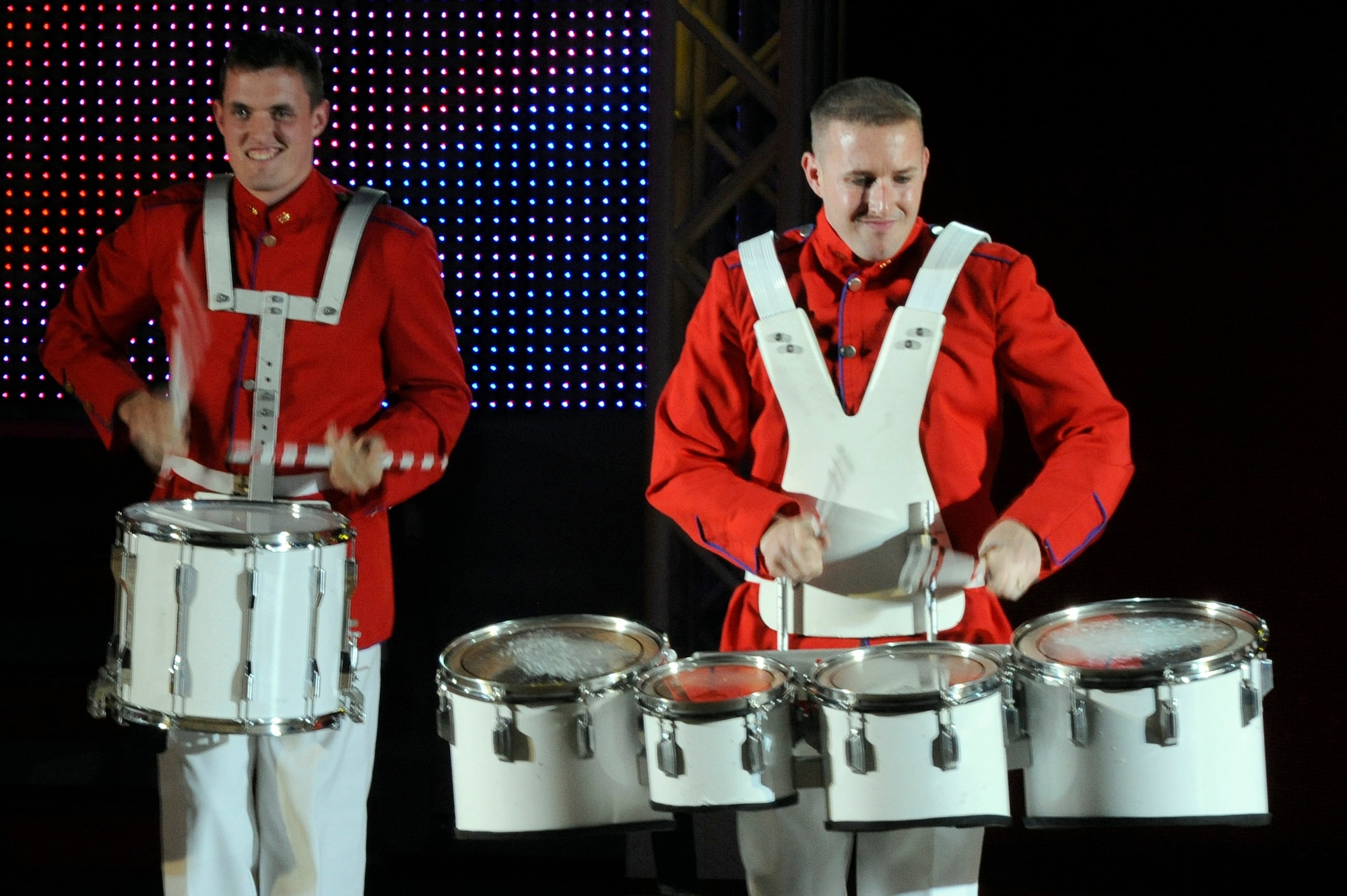 MISAWA AIR BASE, Japan - Senior Airman Cordero Nichols, left, and Tech. Sgt. Douglas Boren, members of the Tops In Blue 2011 World Tour, play the drums during a performance at the Misawa Civic Center in Misawa City Nov. 15. More than 1,000 Japanese and Americans attended the free show which featured the swinging jazz of Nat King Cole, the great rock and roll sounds of Little Richard, cool Motown Rhythm and Blues of Marvin Gaye, some inspirational country sounds and much more. (U.S. Air Force photo/Tech. Sgt. Marie Brown)