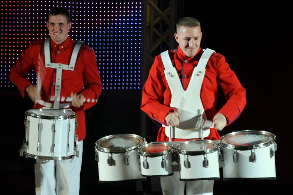 Senior Airman Cordero Nichols, left, and Tech. Sgt. Douglas Boren, members of the Tops In Blue 2011 World Tour, play the drums during a performance at the Misawa Civic Center in Misawa City near Misawa Air Base, Japan, Nov. 15. More than 1,000 Japanese and Americans attended the free show which featured the swinging jazz of Nat King Cole, the great rock and roll sounds of Little Richard, cool Motown Rhythm and Blues of Marvin Gaye, some inspirational country sounds and much more. (U.S. Air Force photo/Tech. Sgt. Marie Brown) 

