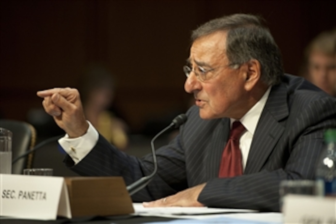 Secretary of Defense Leon E. Panetta answers questions from Sen. John McCain during testimony to the Senate Armed Services Committee on November 15, 2011.  