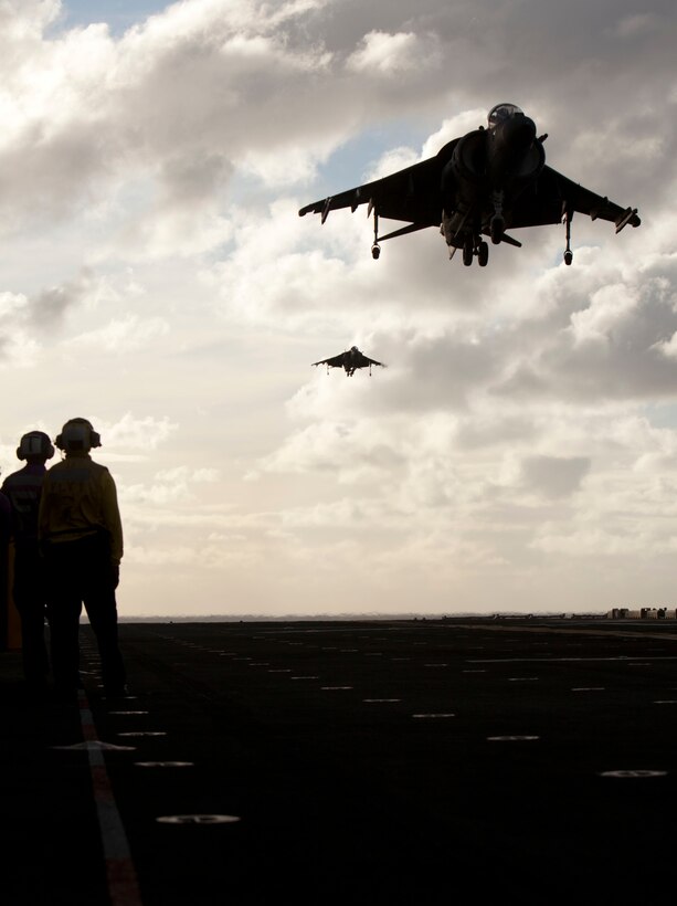 An AV-8B Harrier with Marine Medium Helicopter Squadron 268 (Reinforced) lands on USS Makin Island here Nov. 18. The squadron is the aviation combat element for the 11th Marine Expeditionary Unit, embarked USS Makin Island, USS New Orleans and USS Pearl Harbor in San Diego Nov. 14 beginning a seven-month deployment to the Western Pacific and Middle East regions.