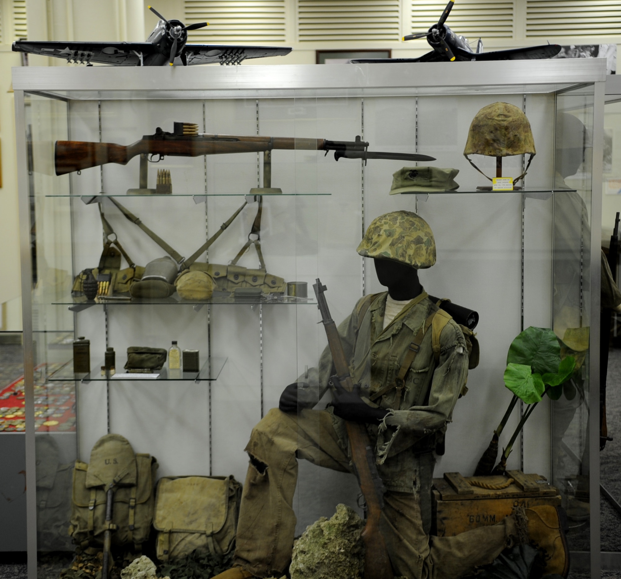 Equipment worn by American Marines during the Battle of Okinawa. This display is part of an exhibit located on Camp Kinser and highlights artifacts from the 82 day battle. (U.S. Air Force photo by Staff Sgt. Christopher Hummel/Released)