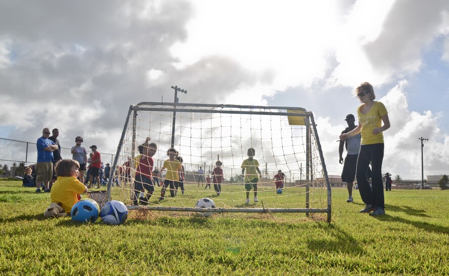 ANDERSEN AIR FORCE BASE, Guam -- Children ages 3-5 play in a soccer game
Nov. 20 here as part of the new 'Sports for Tots' program. The soccer season
began Nov. 8 and will last six-week sessions giving parents time to sign their children up. The next season sport will be baseball then football and cheerleading. There will be roughly a two week break between each season. For more information, e-mail Mrs. Rhine at sportsfortotsaaf@yahoo.com or visit the Sports for Tots Facebook page using the same e-mail address.  (U.S. Air Force photo/Staff Sgt. Alexandre Montes)
