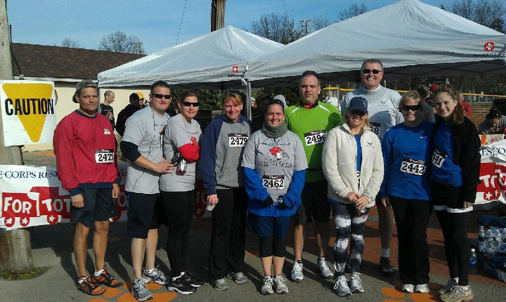 HOWLAND, Ohio —  Air force Reservists with the 910th Airlift Wing gather for a group photo before participating in the 2011 Veterans Day/Marine Corps Birthday/Toys for Tots 5K fun run/walk held on November 19. All proceeds were given to the Trumbull and Mahoning Toys For Tots campaign. A moment of silence was observed in remembrance of fallen comrades from past and present wars and battles. Courtesy Photo.