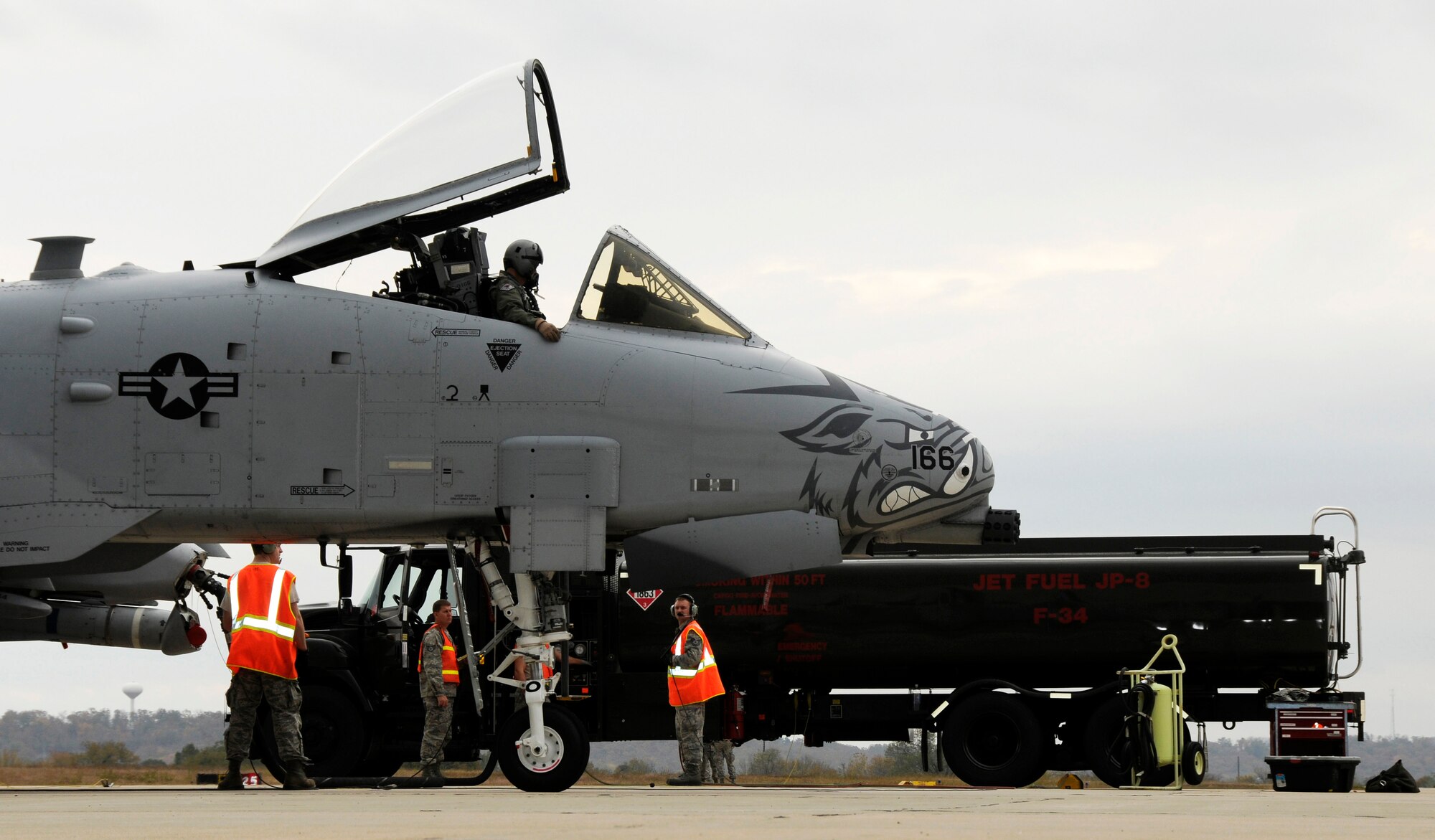 Airmen with the 188th Fighter Wing conduct “hot-pit” refueling during a Unit Training Assembly at the 188th Nov. 6. The process is required training for Airmen and is a common practice in the Unites States Central Command Area of Responsibility. The objective of the process is to increase the number of sorties by decreasing the number of thru-flight inspections required each time the engines shut down. (U.S. Air Force photo by Airman 1st Class Hannah Landeros/188th Fighter Wing Public Affairs)