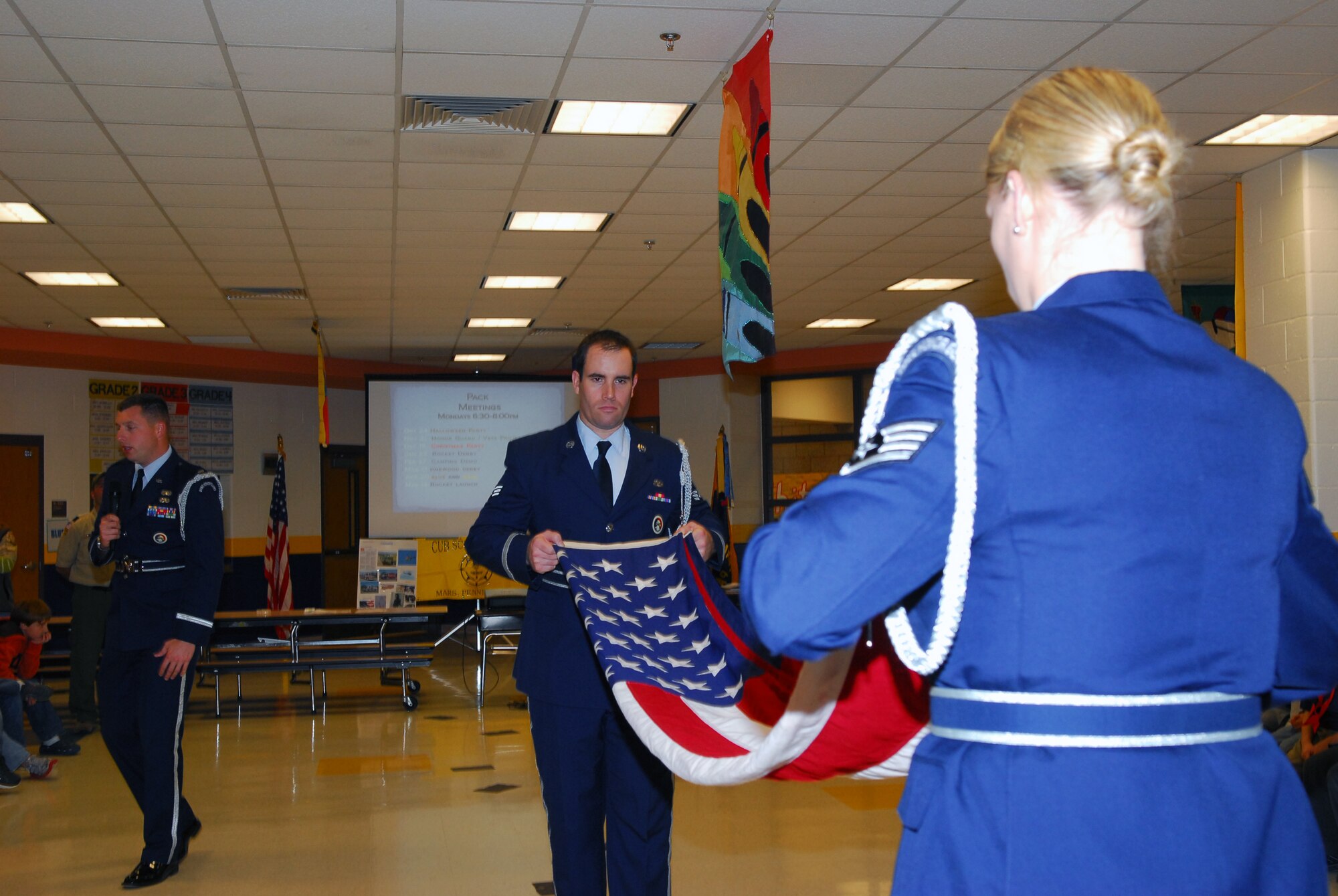 The 171st Air Refueling Wing Honor Guard presented the colors and demonstrated folding an American flag to more than 75 Mars Area Cub Scouts, part of Pack 413, at Mars Elementary School Nov. 21. (National Guard photo by Tech. Sgt. Stacy Gault)