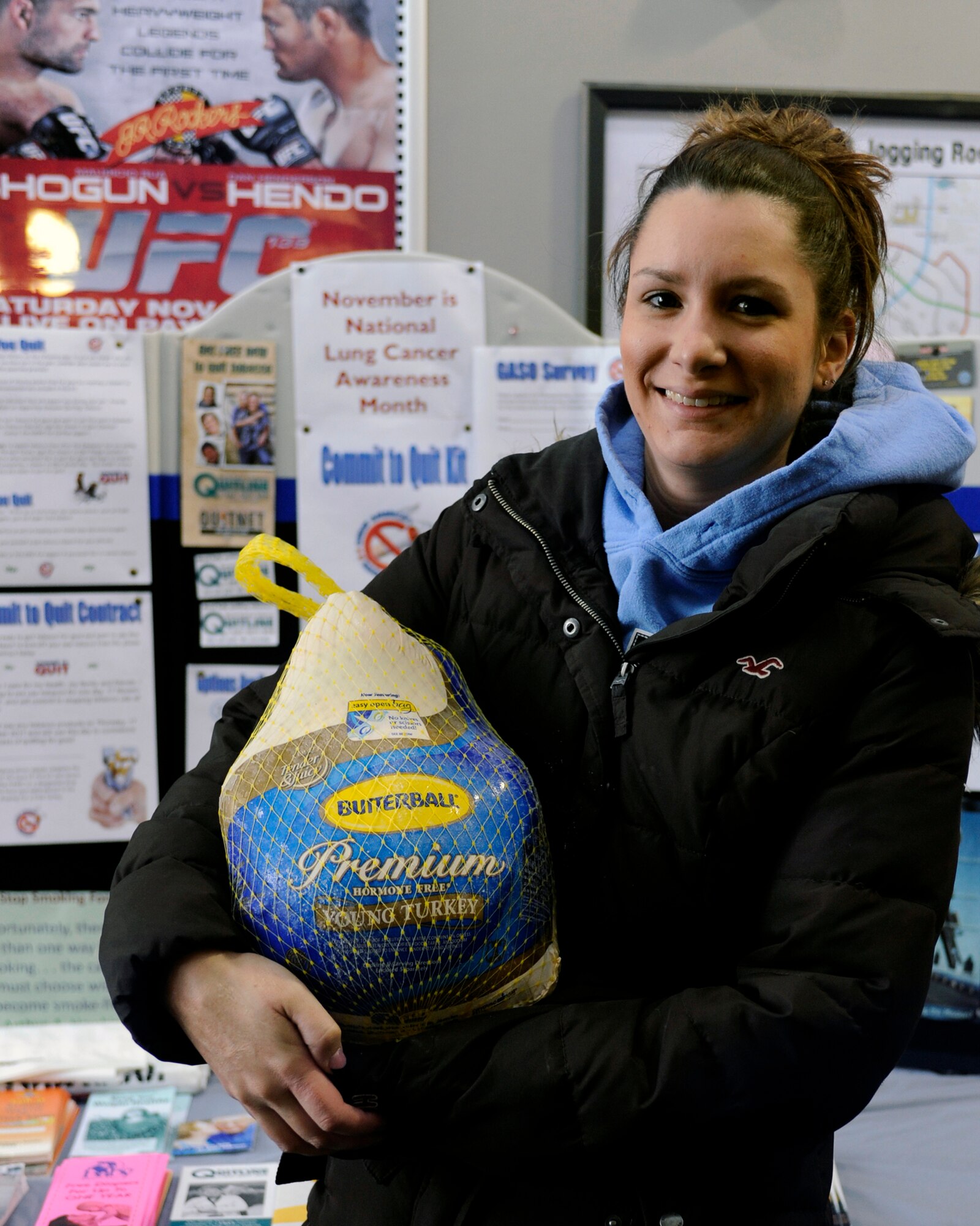 MINOT AIR FORCE BASE, N.D. -- Rebecca Merrill, a spouse here, was one of several individuals who were presented with a turkey for winning a drawing held as part of the 36th Annual Great American Smokeout Nov. 17. Here at Minot AFB, over 30 Airmen and their dependents took the pledge to quit smoking. As a reward for that pledge, they were entered into the drawing to win a free turkey. (U.S. Air Force photo/Airman 1st Class Stephanie Ashley)

