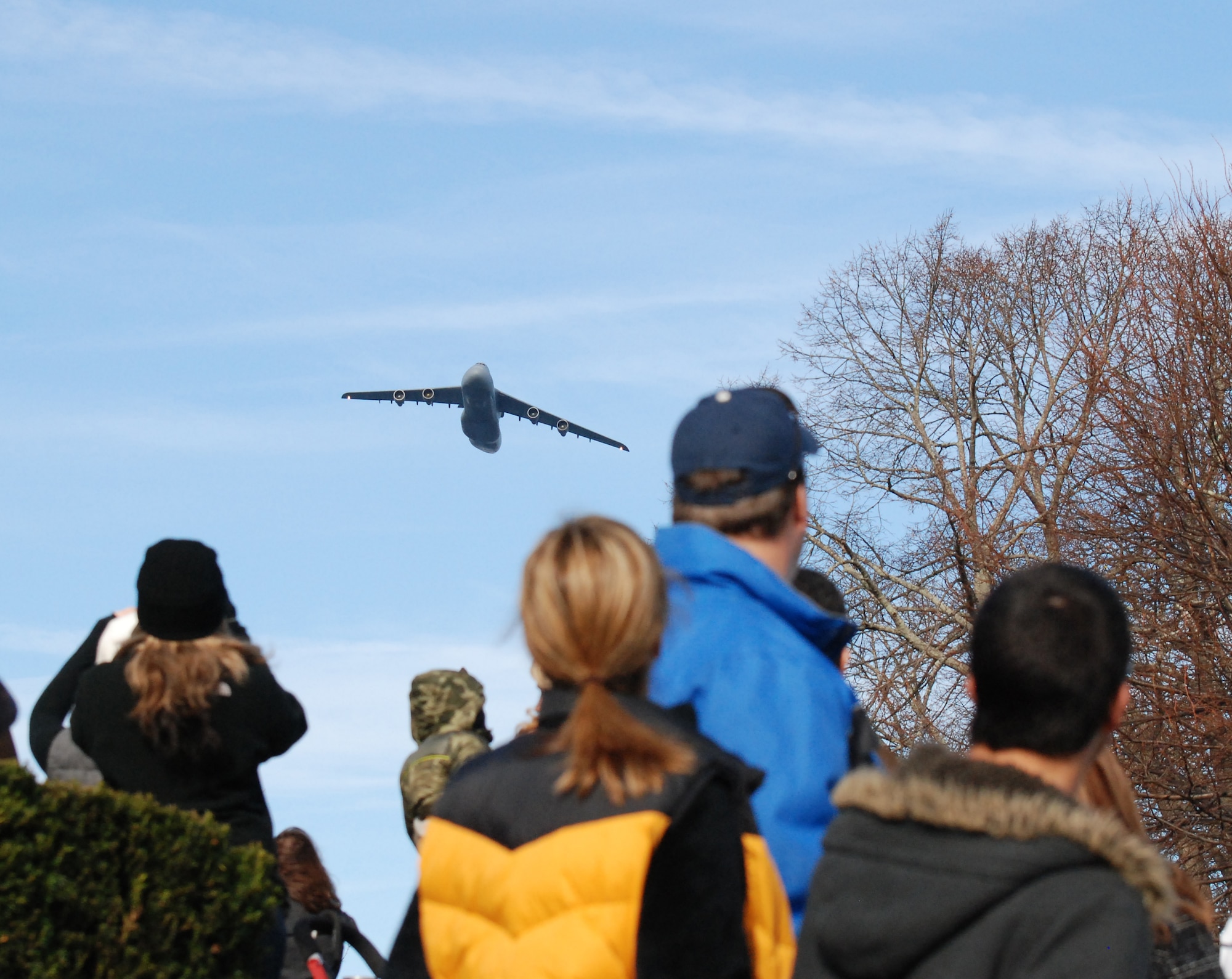 A Patriot Wing C-5B flies over the Plymouth, Mass., Thanksgiving parade Nov. 19. (US Air Force photo/Lt. Col. James Bishop)