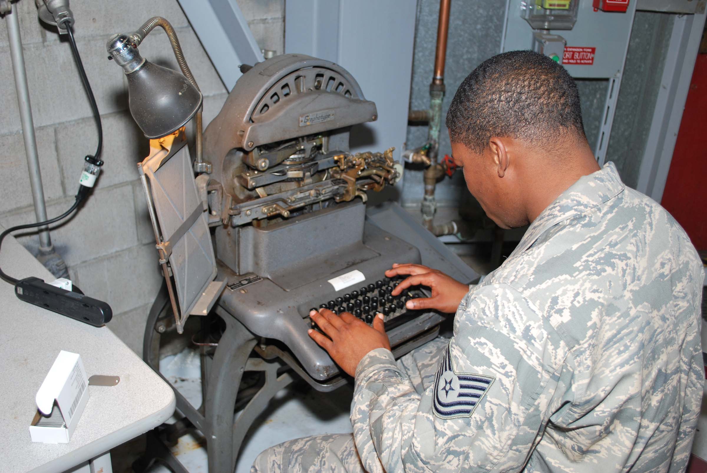 Making dog tags on a legacy machine > Air Force Reserve Command > News  Article