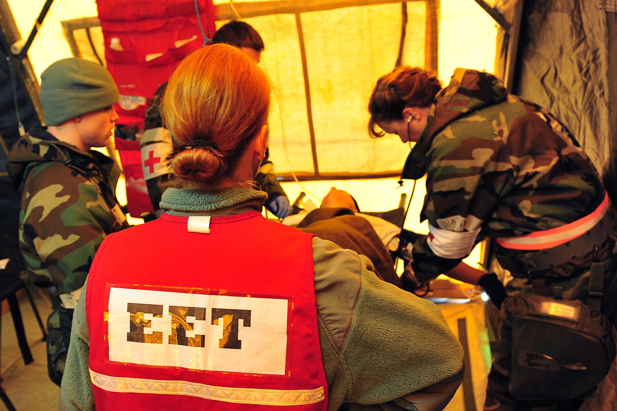 U.S. Air Force Master Sgt. Keri Winsick, 55th Medical Operations Squadron, evaluates 55th Medical Group members during an operational readiness exercise at Offutt Air Force Base, Neb., Nov. 17. During the ORE, evaluation teams were on scene to assess Airmen in their response to emergency situations.  (U.S. Air Force Photo by Charles Haymond/Released).