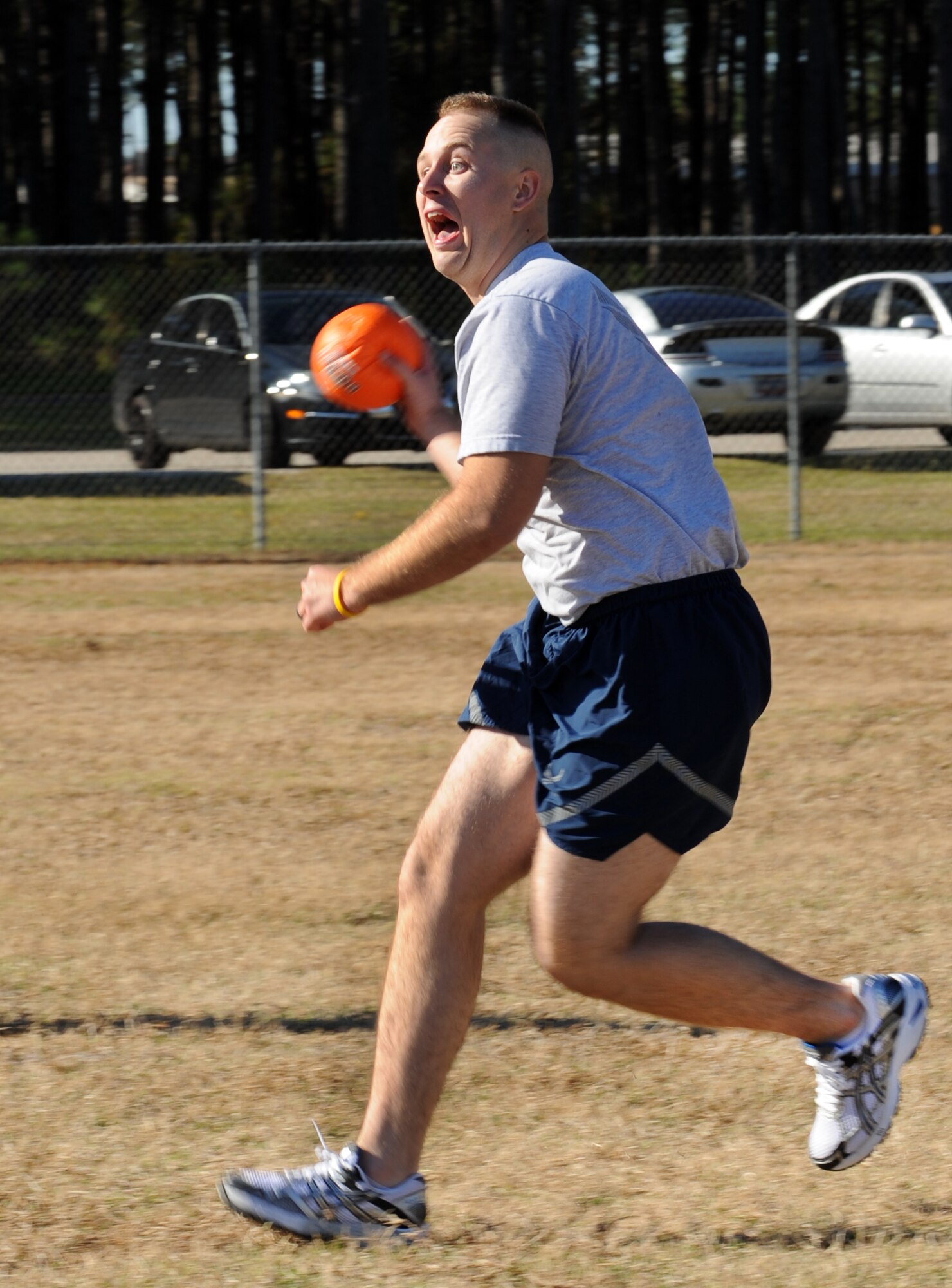 U.S. Air Force Airman 1st Clas Nicholas Pratt, 20th Civil Engineering Squadron structures, prepares to throw a ball at the opponent during the 20th Mission Support Group Warrior Challenge, Shaw Air Force Base, S.C., Nov. 18, 2011. The 20th MSG held a Warrior Challenge to boost the morale and camaraderie of the Airmen. The 20th MSG Warrior Challenge consisted of a physical training challenge, three-mile rucksack march and an obstacle course. (U.S. Air Force photo by Airman 1st Class Tabatha Duarte/Released)