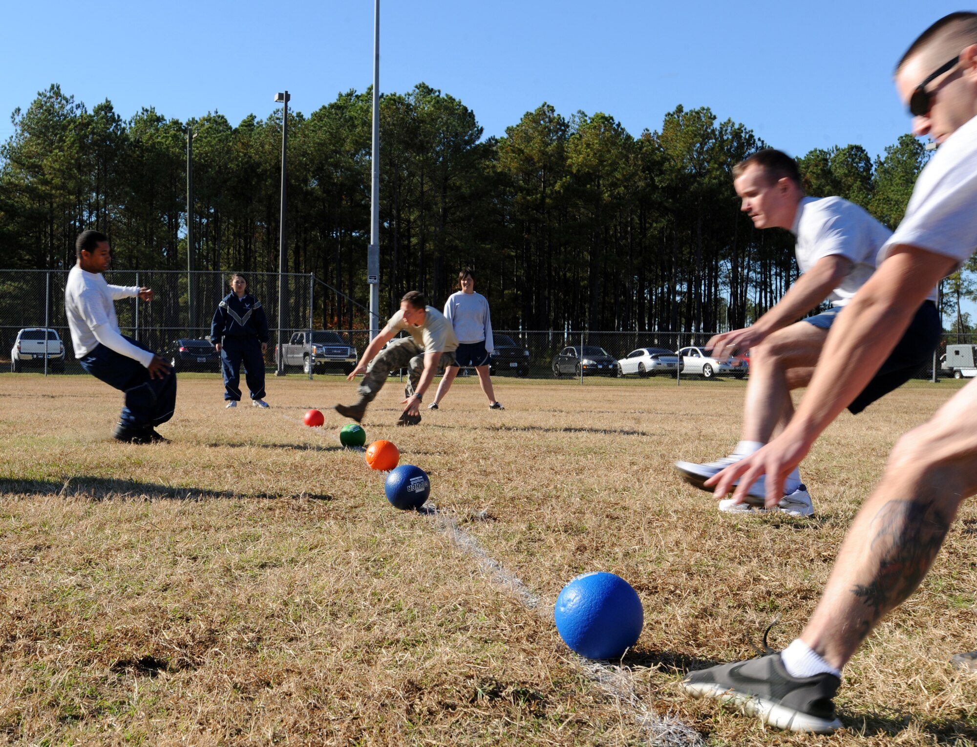 U.S. Air Force Airmen participate in dodge ball during the 20th Mission Support Group Warrior Challenge, Shaw Air Force Base, S.C., Nov. 18, 2011. The 20th MSG held a Warrior Challenge to boost the morale and camaraderie of the Airmen. The 20th MSG Warrior Challenge consisted of a physical training challenge, three-mile rucksack march and an obstacle course. (U.S. Air Force photo by Airman 1st Class Tabatha Duarte/Released)