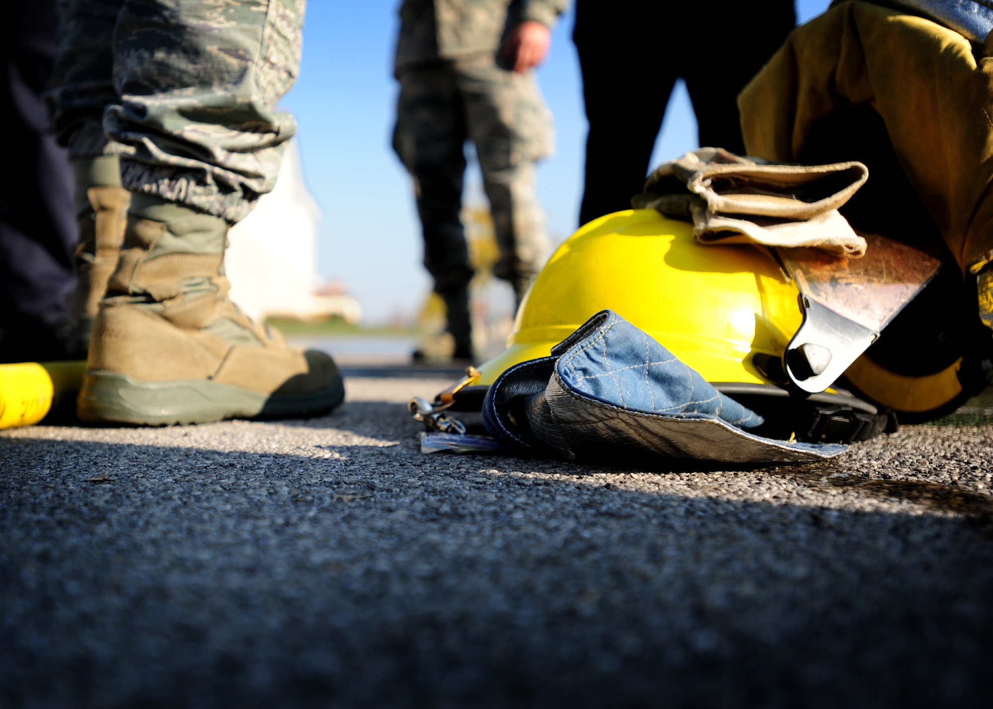 A firefighters helmet lays on the ground after a training exercise Nov. 19 at Aviano Air Base, Italy.  The 31st Civil Engineer Squadron performed an F-16 Fighting Falcon aircraft egress procedures and familiarization training with Slovenian Firefighters. (U. S. Air Force Photo/Senior Airman Evelyn Chavez)
