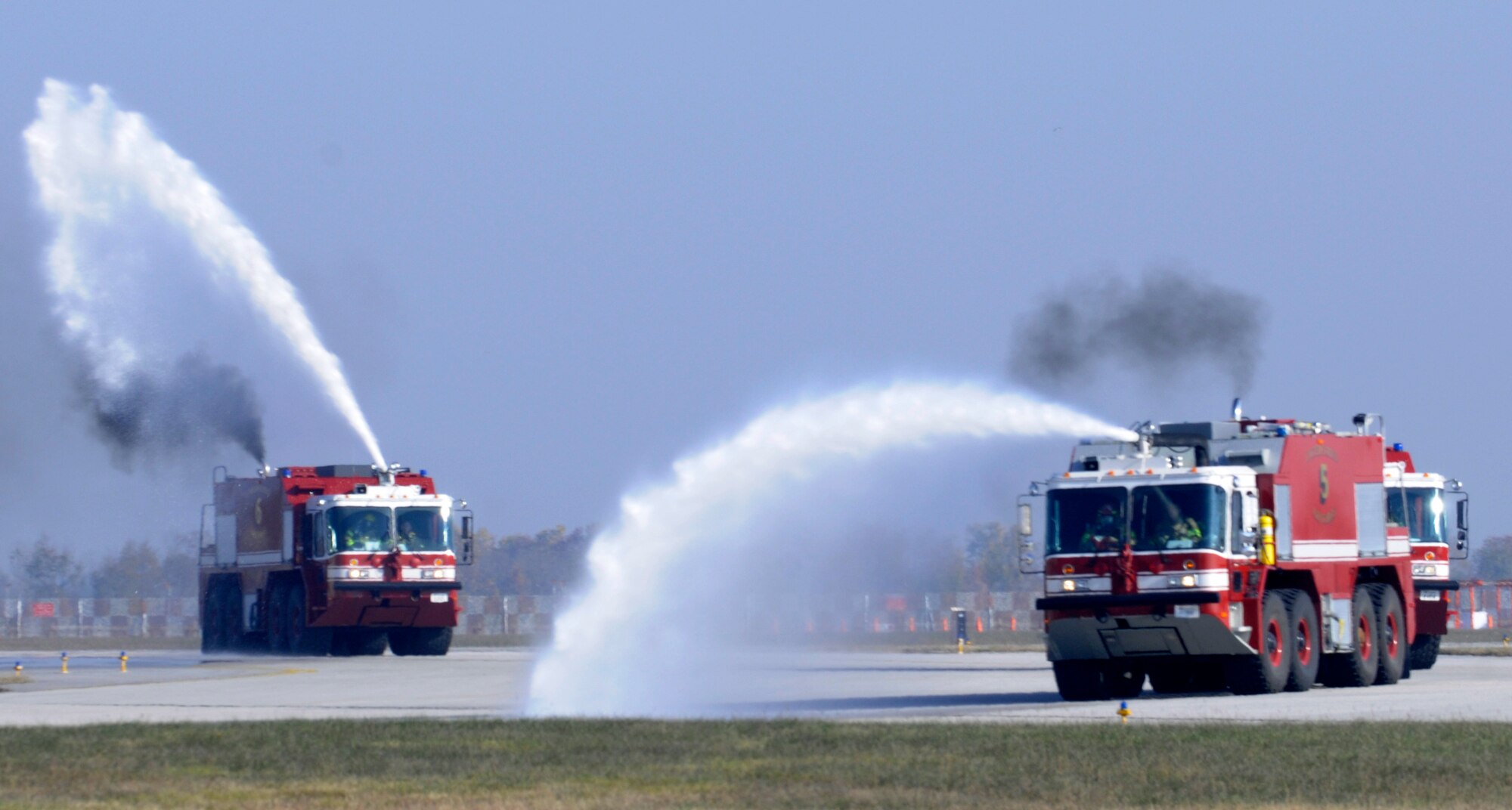 Firefighters of the 31st Civil Engineer Squadron participate in an F-16 Fighting Falcon egress procedures and familiarization exercise Nov.19 at Aviano Air Base. The purpose of the exercise was to show the Slovenian firefighters the different procedures and tools used  to remove a pilot from a smoking cockpit.  (U.S. Air Force Photo/Airman 1st Class Briana Jones)